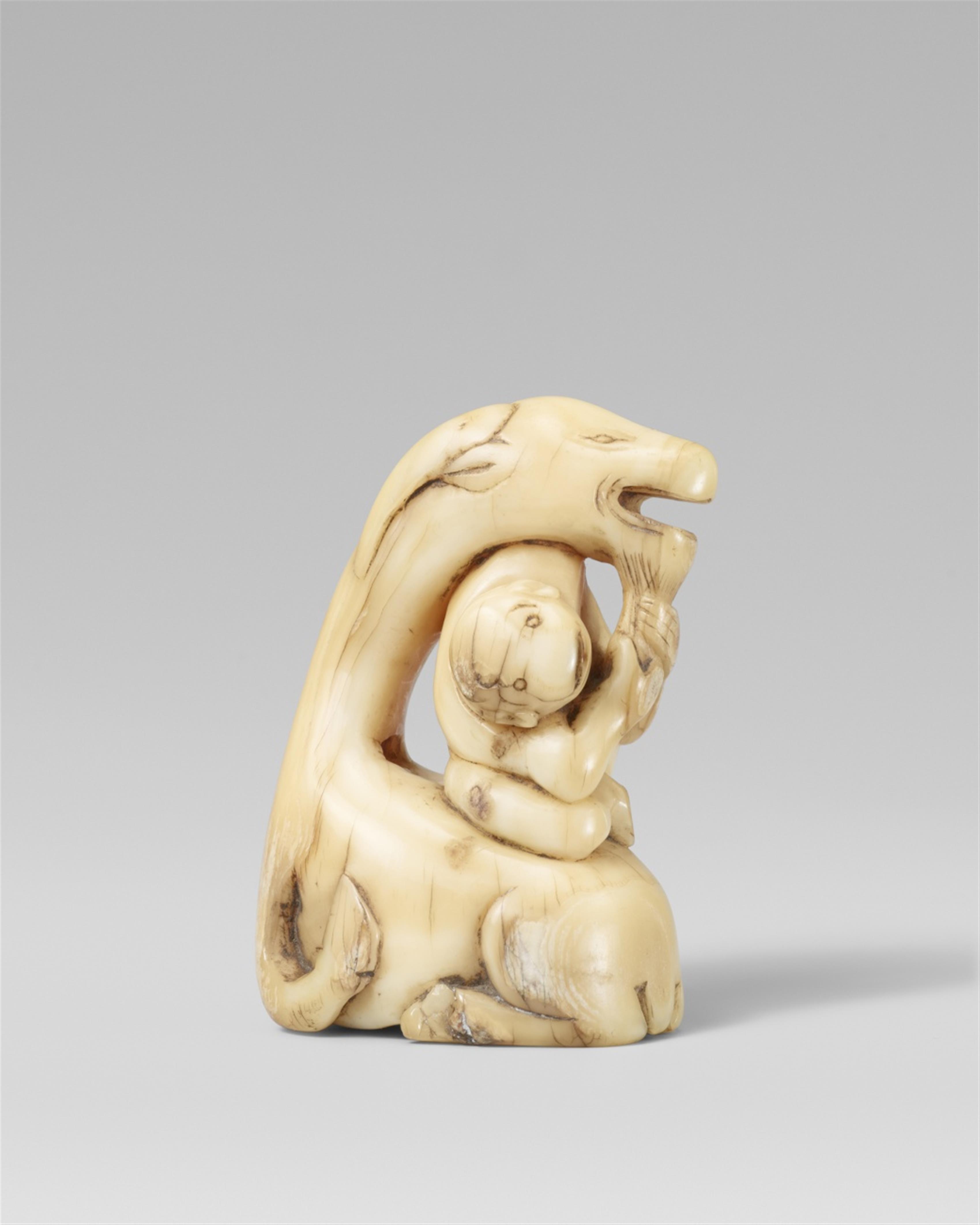 A narwhal tusk netsuke of a goat and a monkey. 18th century - image-1