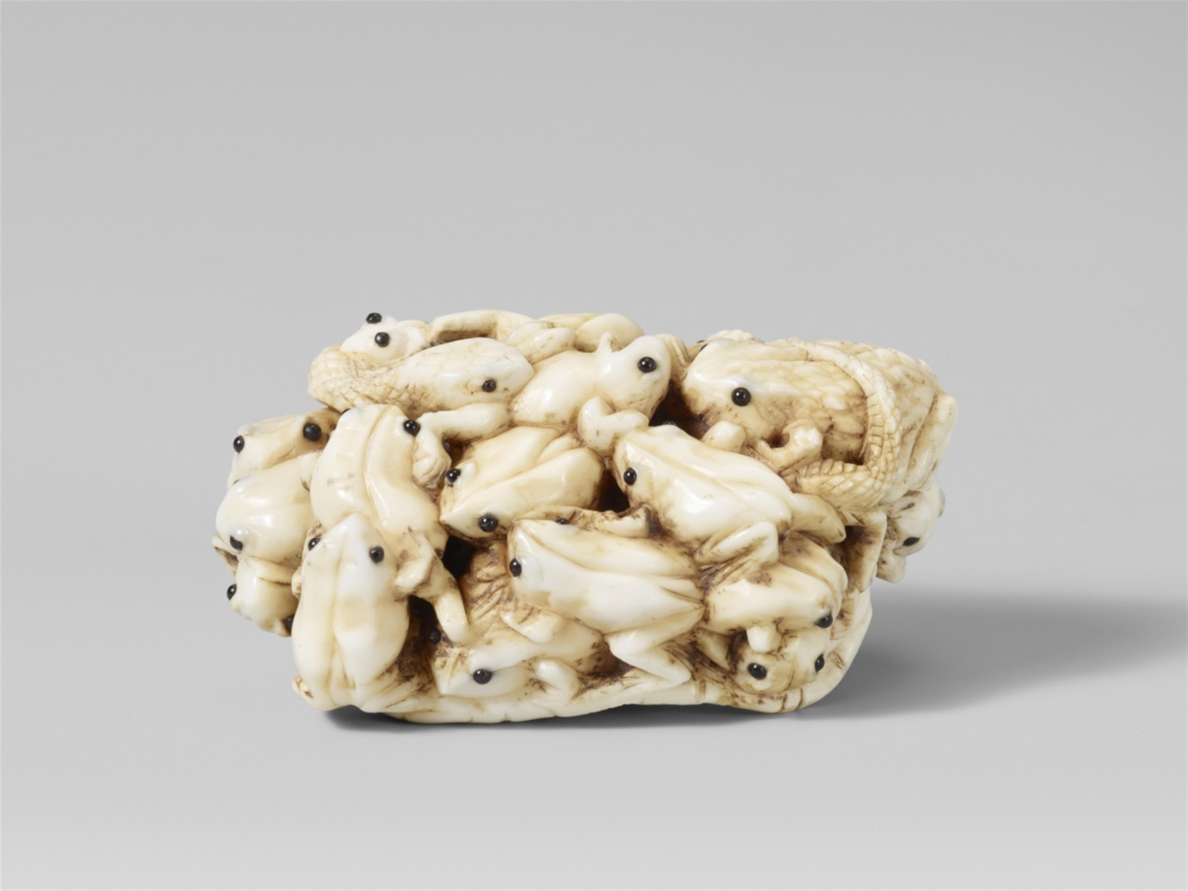 An ivory netsuke of a cluster of frogs on a lotus leaf, by Masamitsu. Late 19th century - image-1