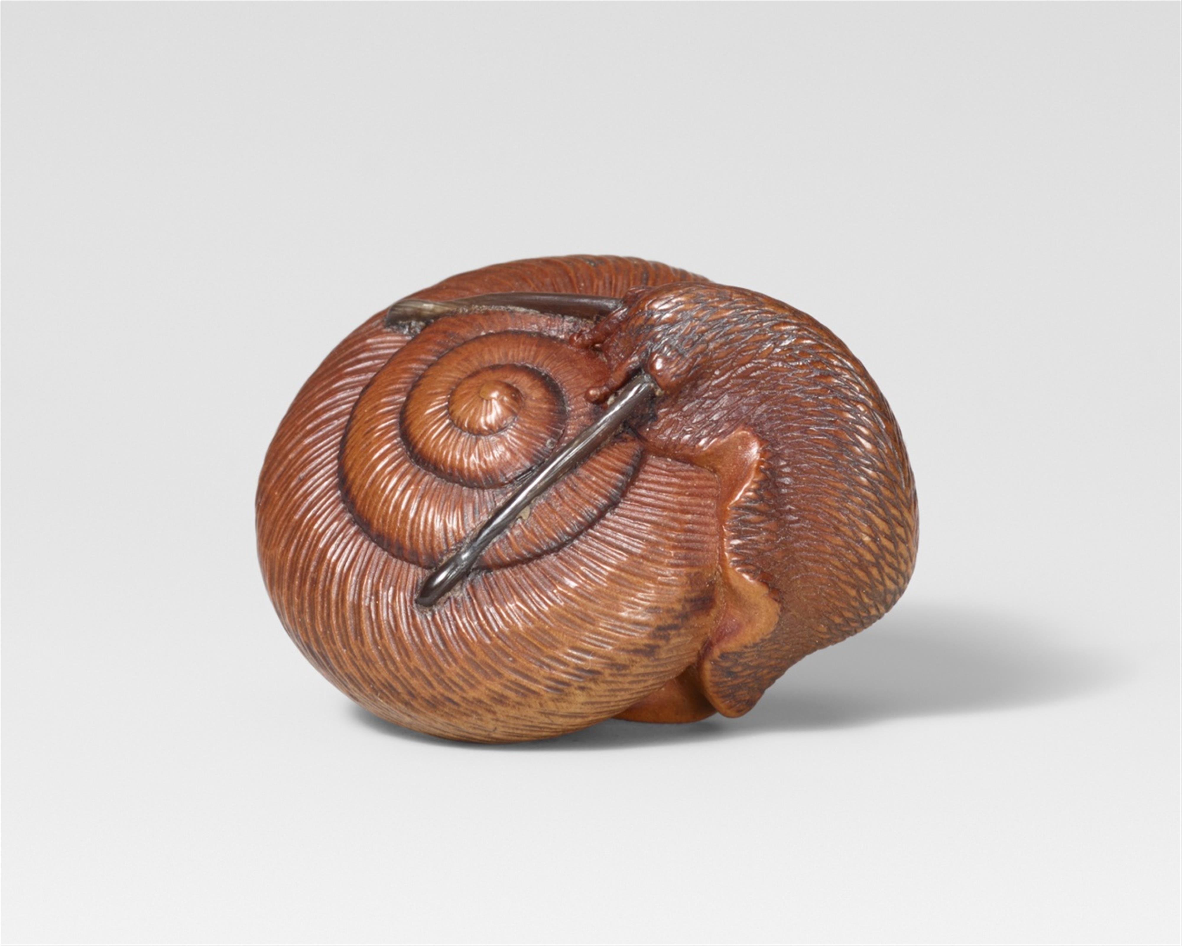 A very fine Nagoya school boxwood netsuke of a snail, by Tadakuni. First half 19th century - image-1