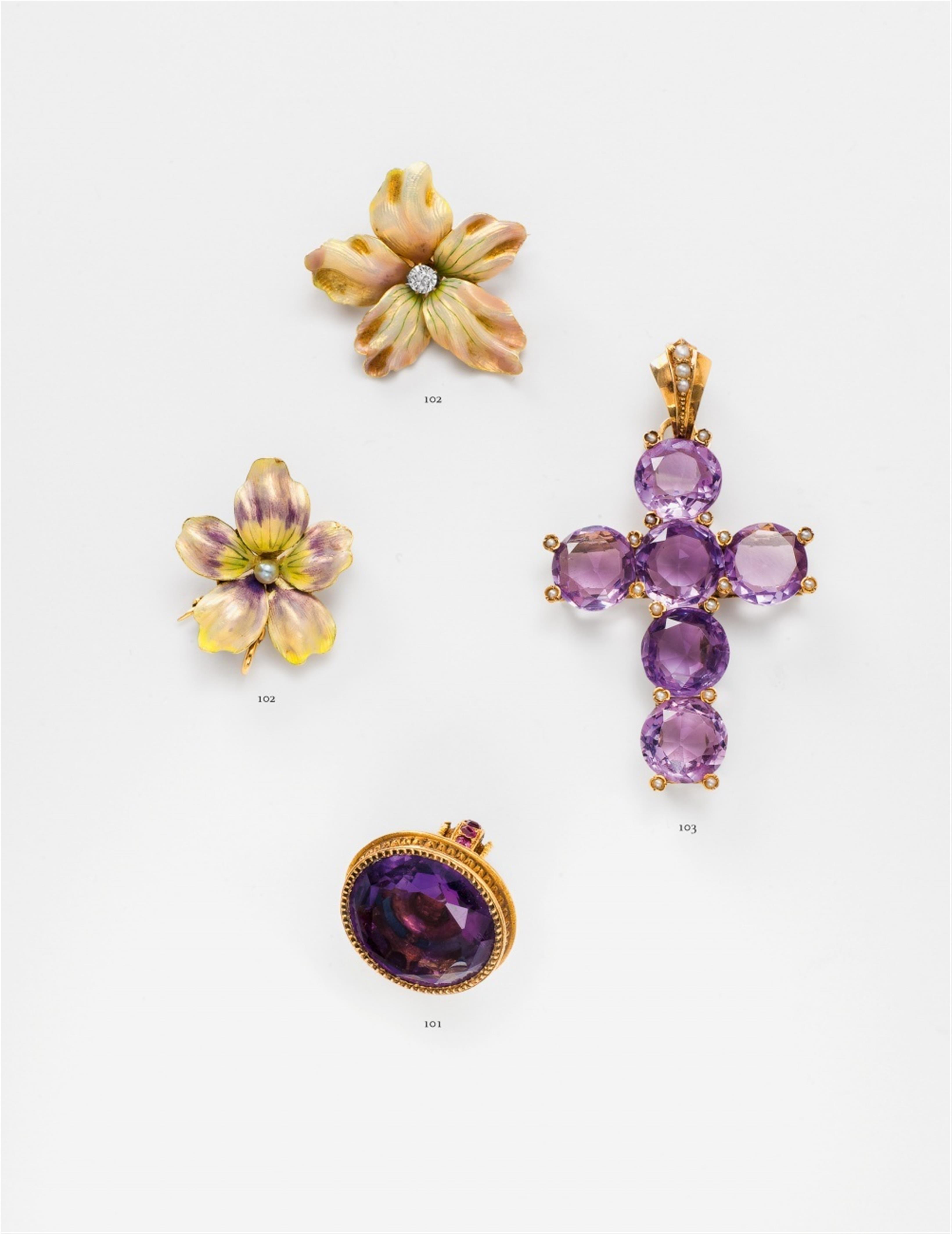 A 14k gold and amethyst cross pendant - image-1