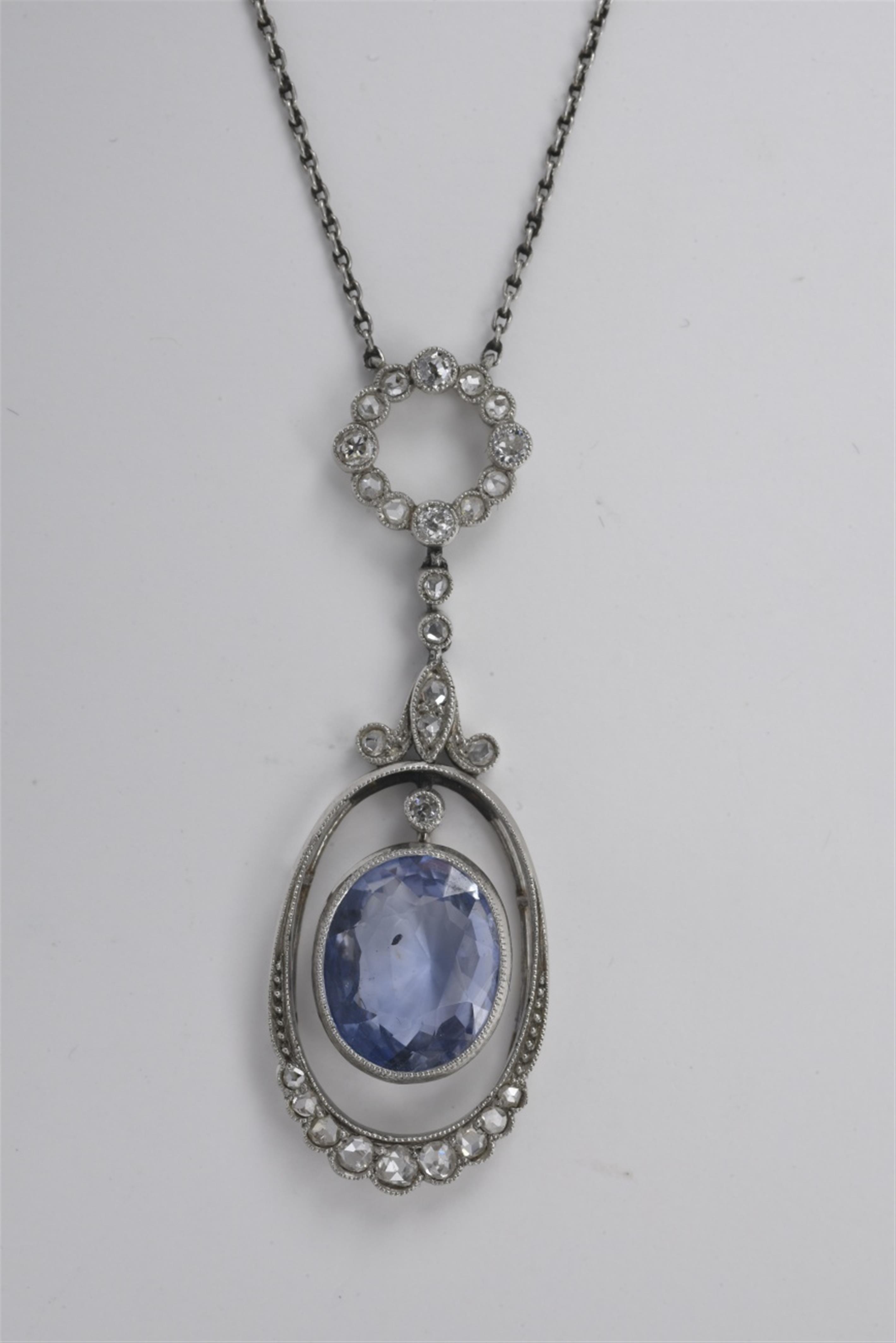 A Belle Epoque platinum, natural sapphire and diamond pendant - image-1