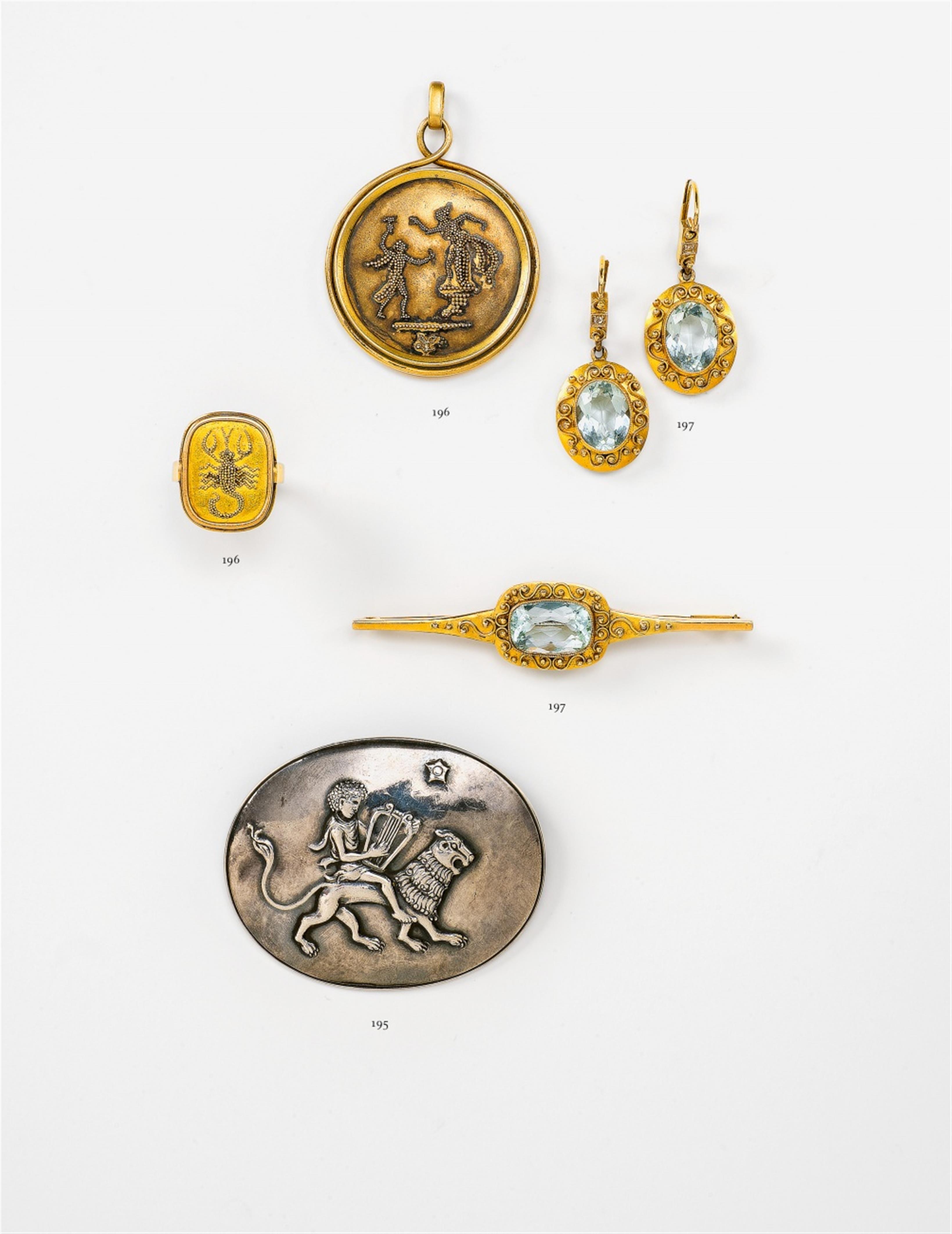 A gold ring and pendant with granulation decor - image-1