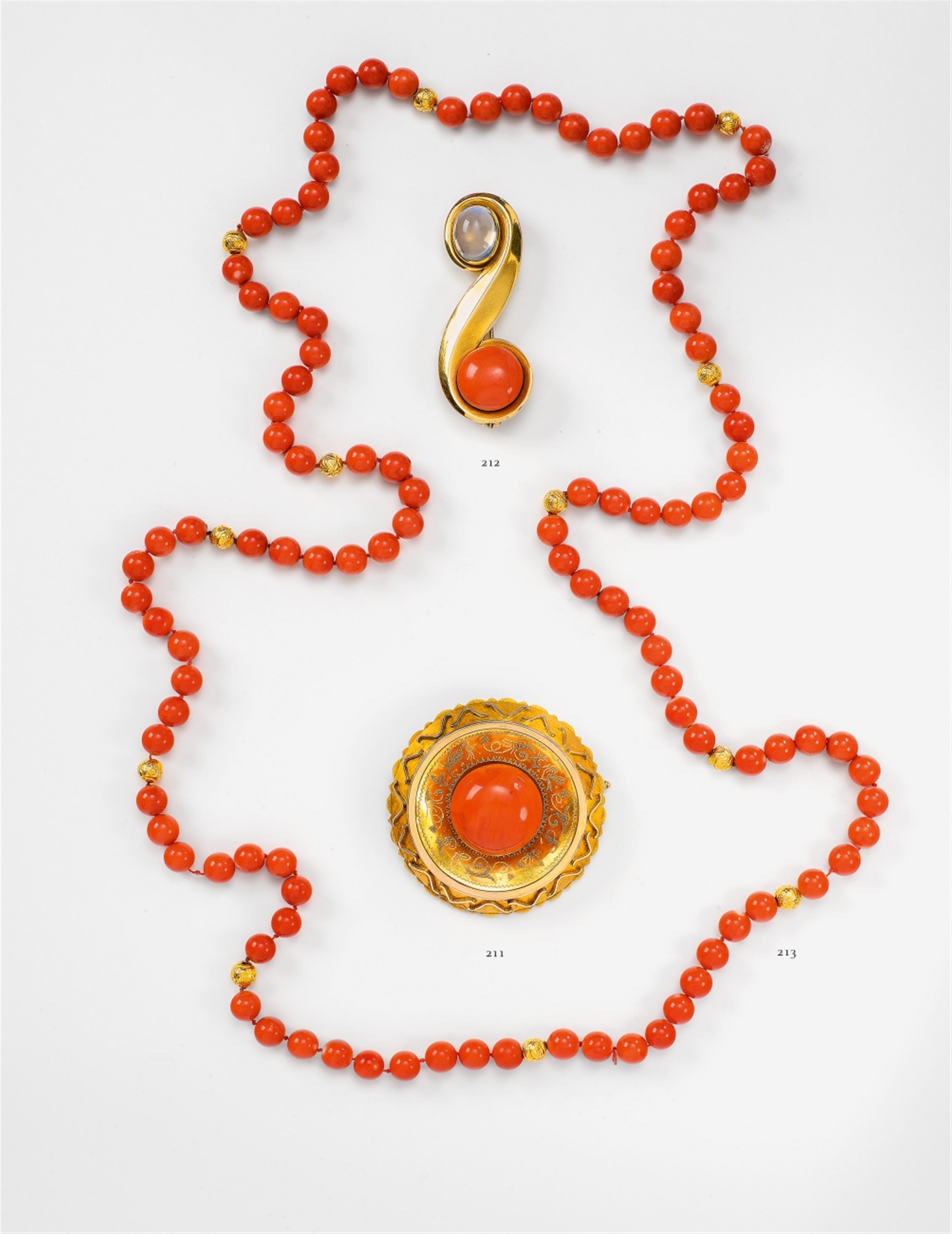 A 14k gold and coral brooch - image-1
