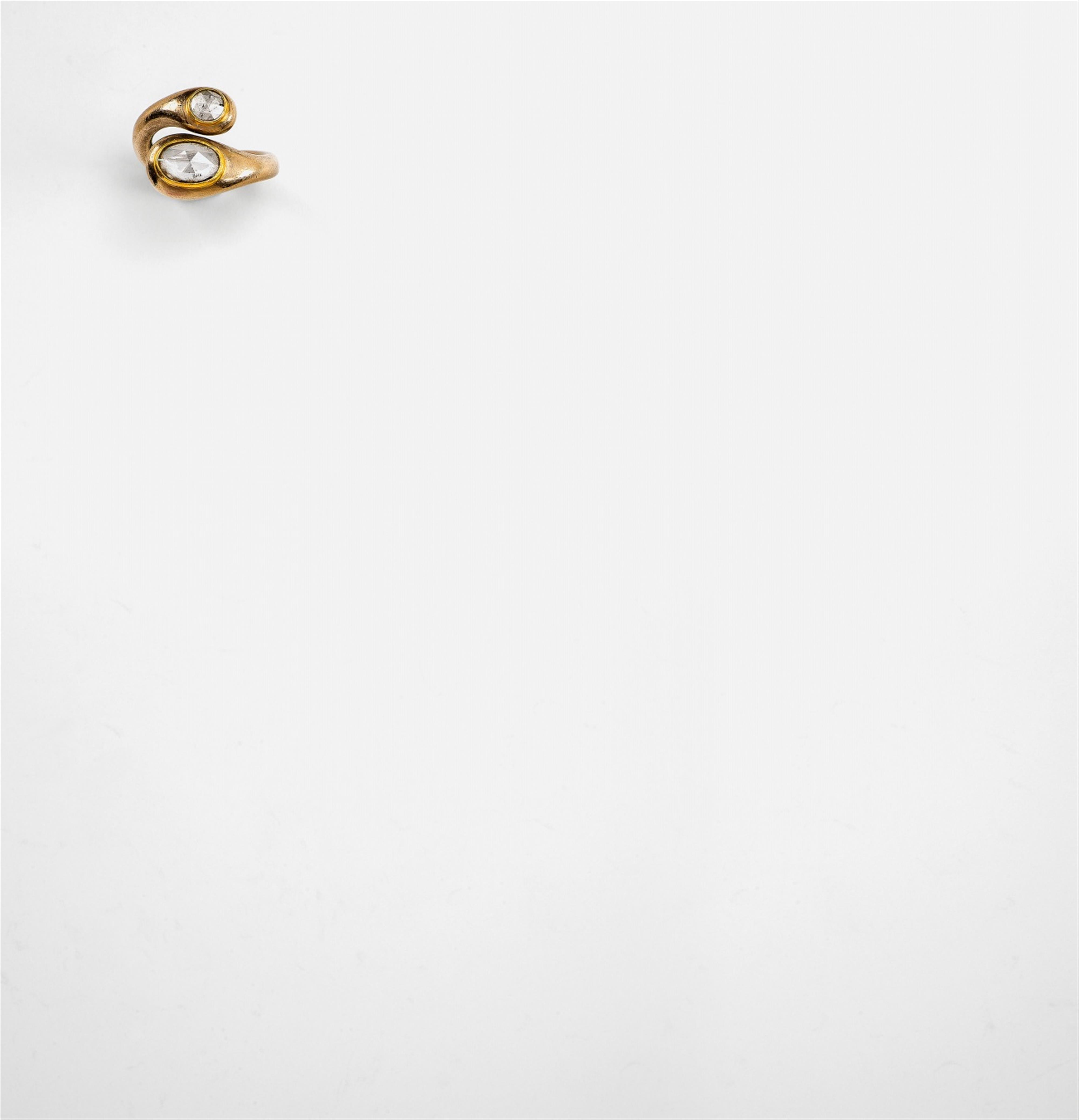 An 18k gold and diamond crossover ring - image-1