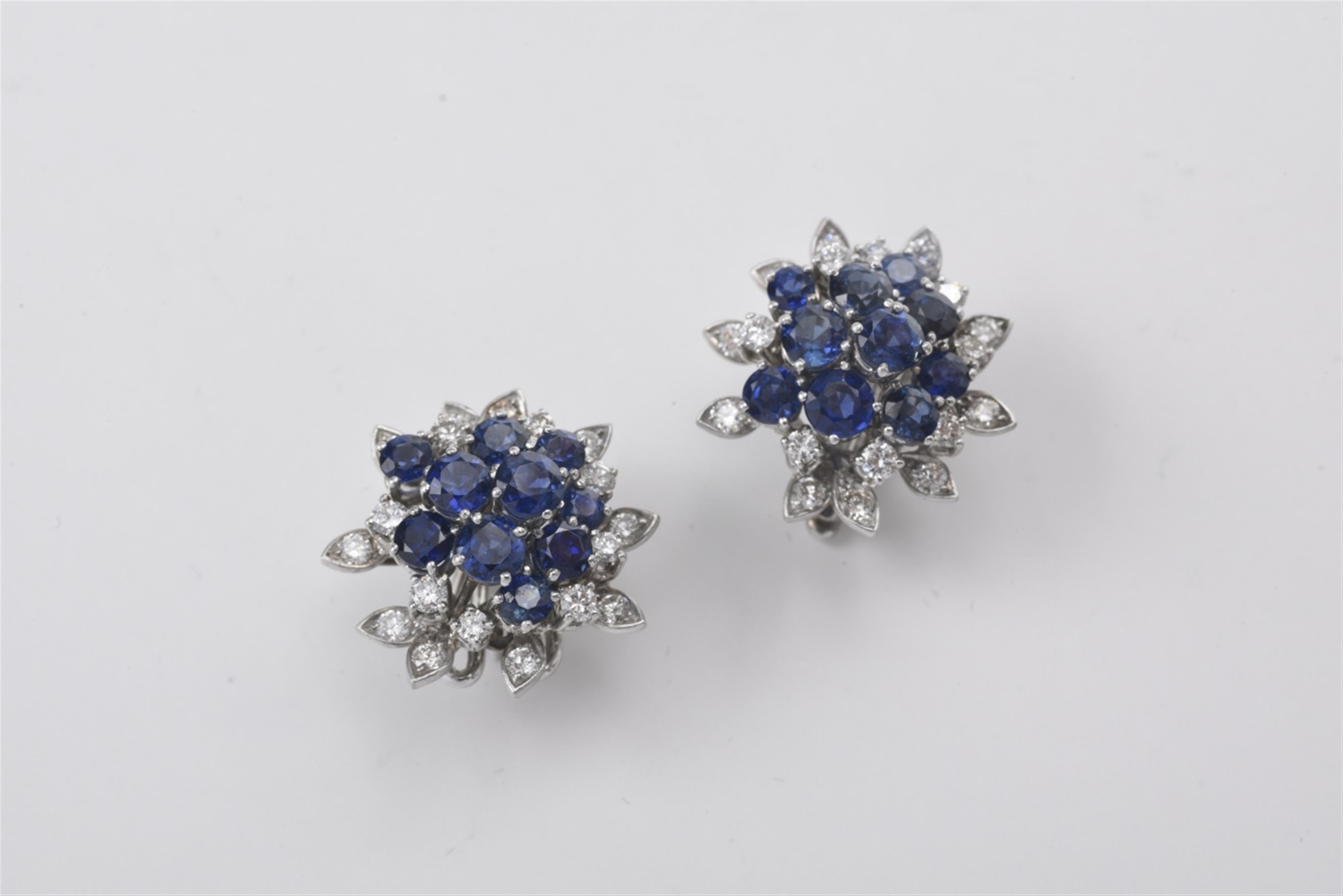 A pair of 18k white gold and sapphire clip earrings - image-1