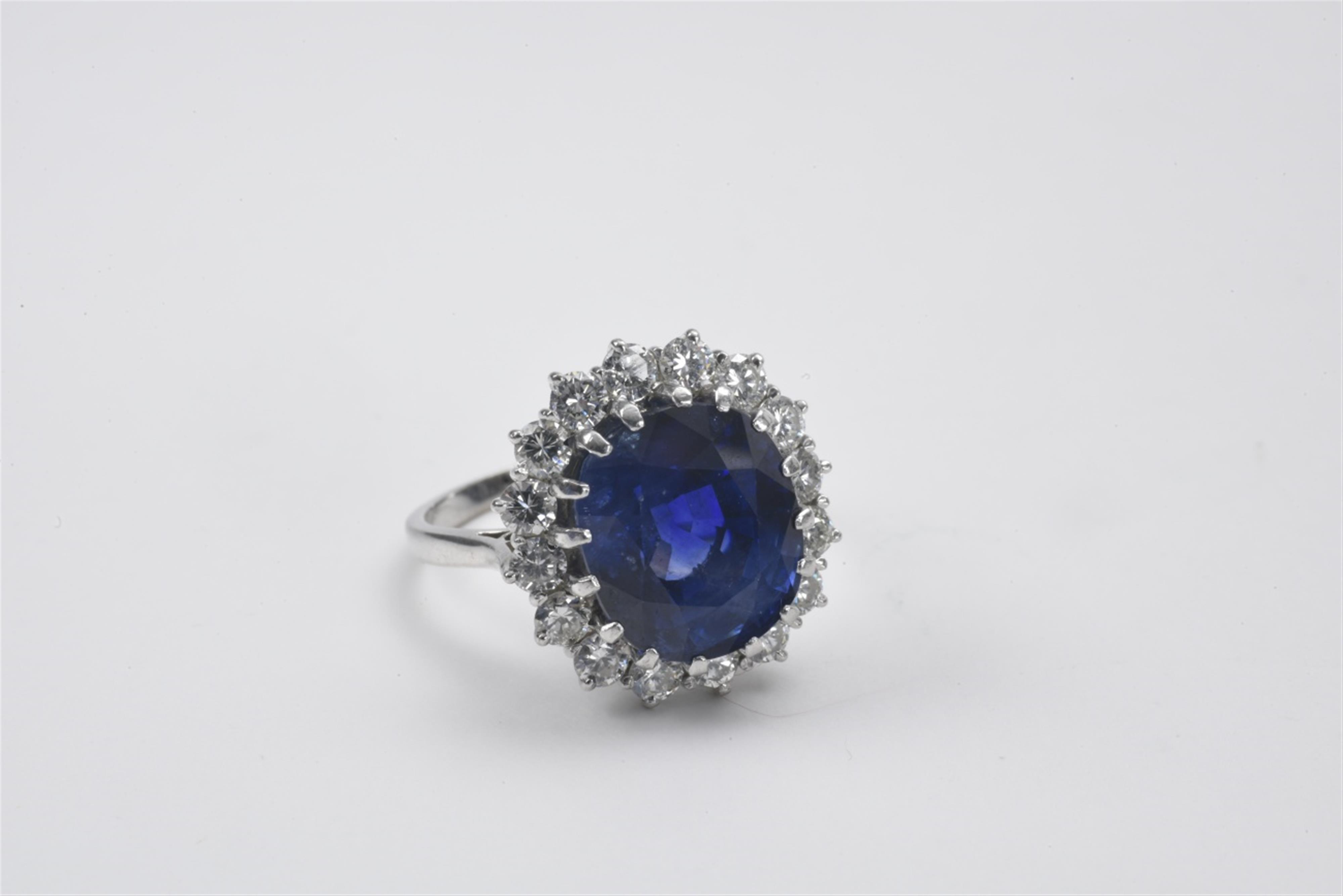 An 18k white gold and sapphire cluster ring - image-2