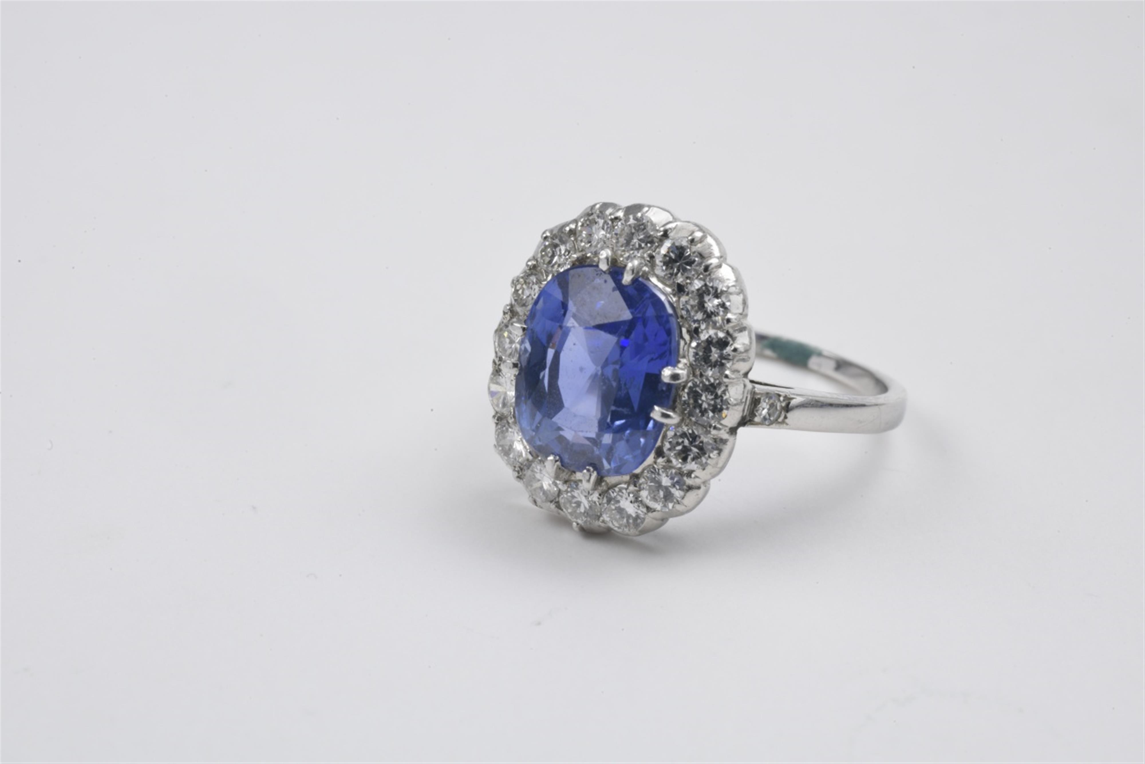 A 14k white gold and Ceylon sapphire ring - image-1