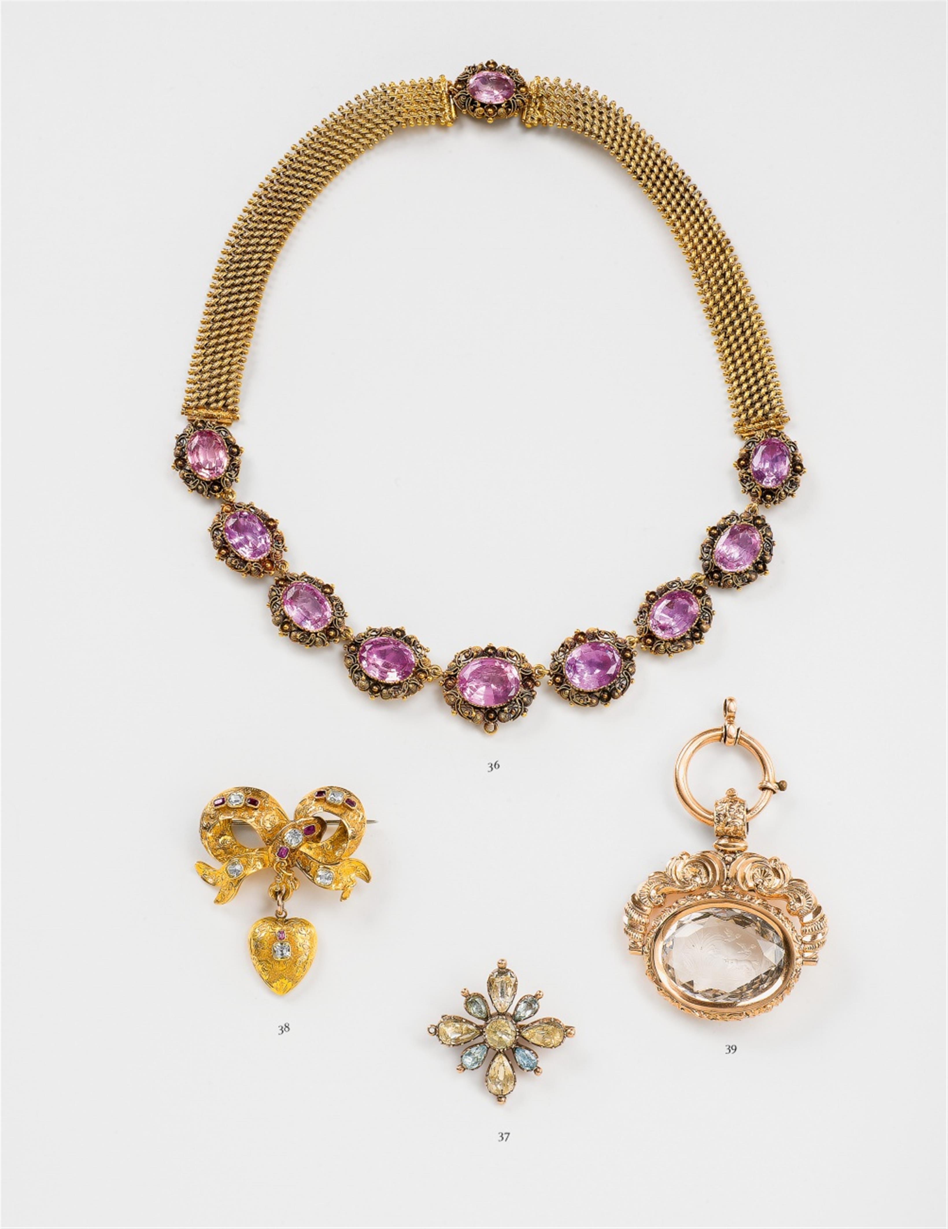 A George III 18k gold, quartz and aquamarine brooch - image-1