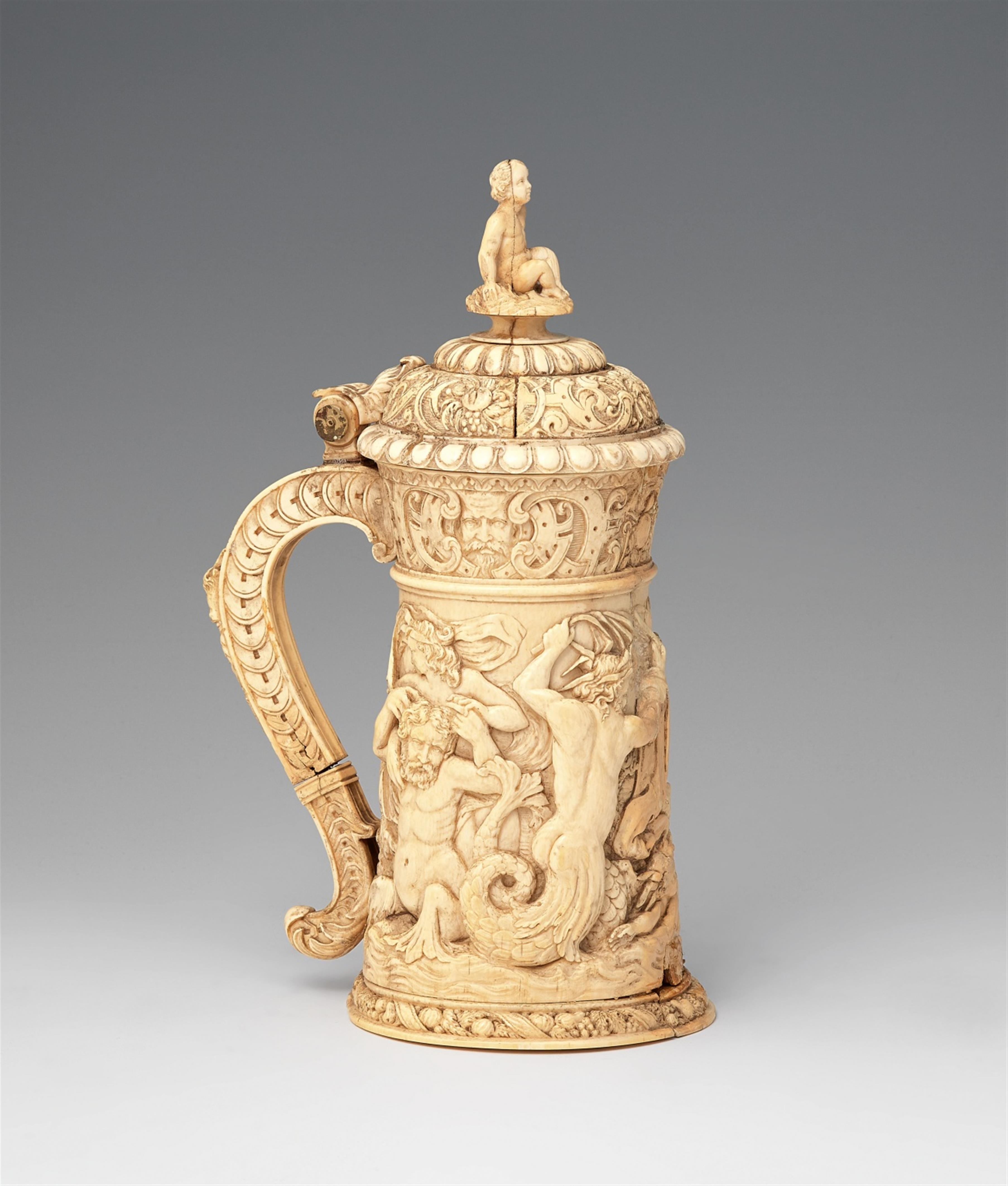 A carved ivory tankard with sea gods - image-3