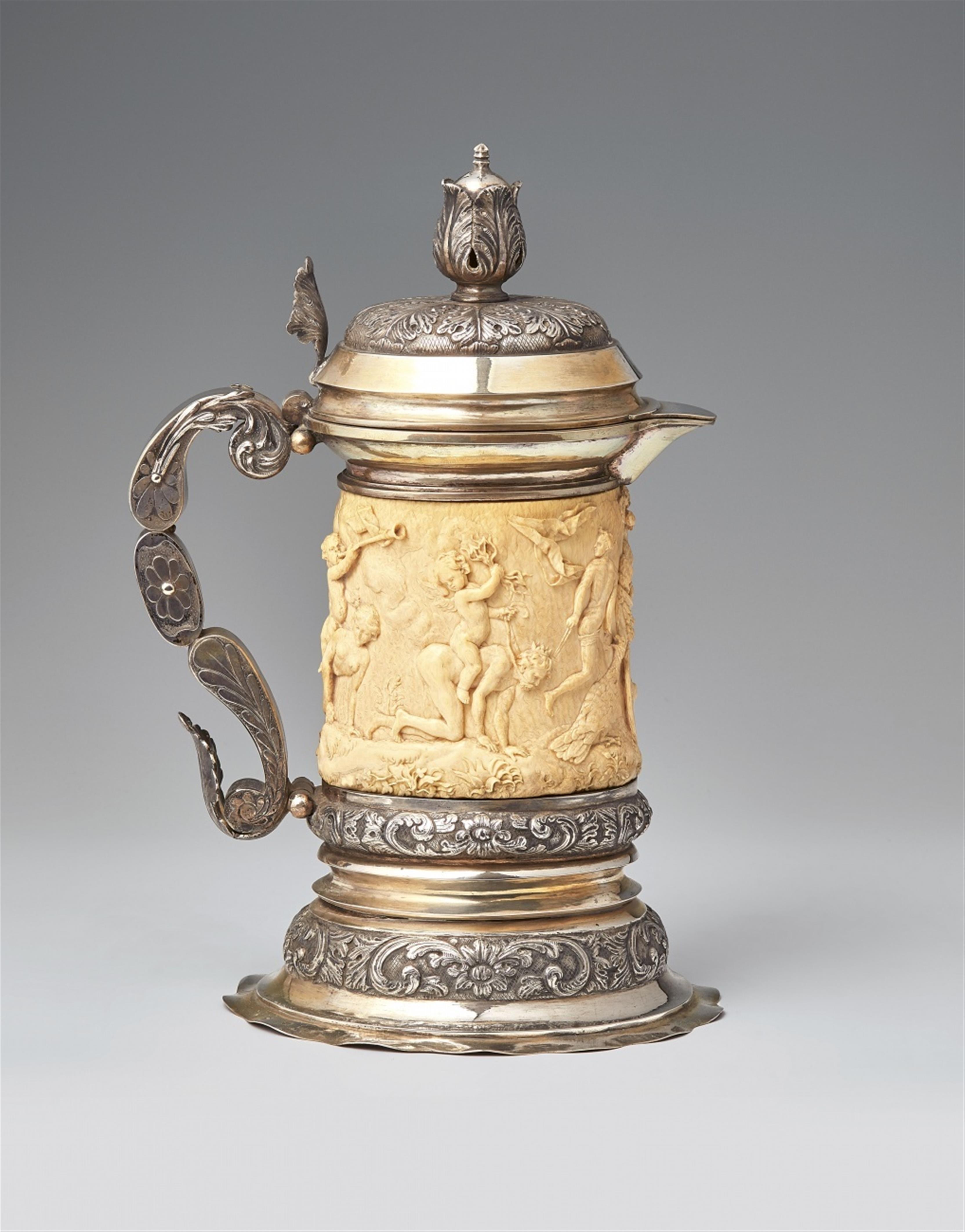 A German parcel gilt silver-mounted ivory jug "Amor vincit omnia" - image-1