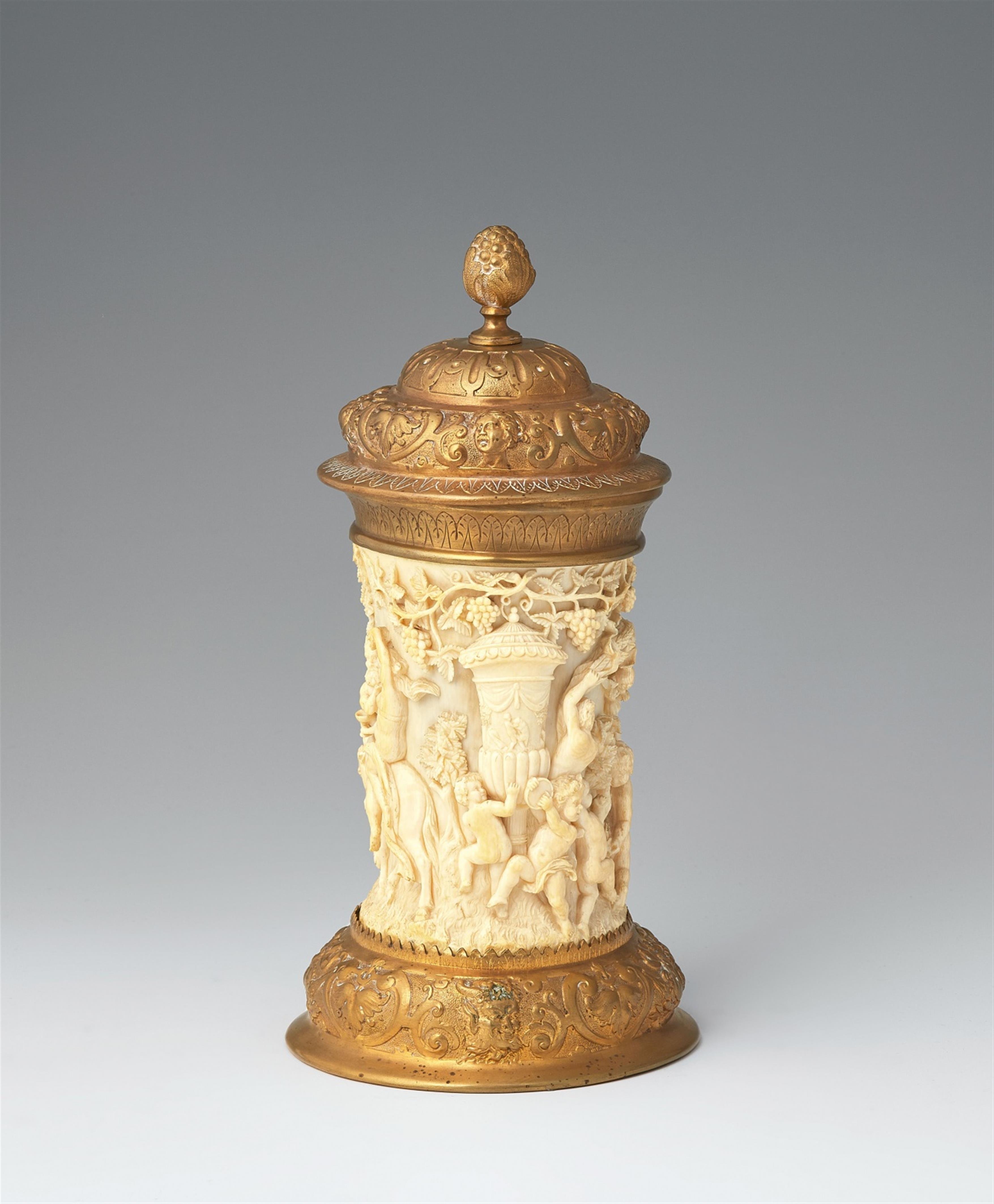 A metal-mounted ivory tankard with putti - image-2