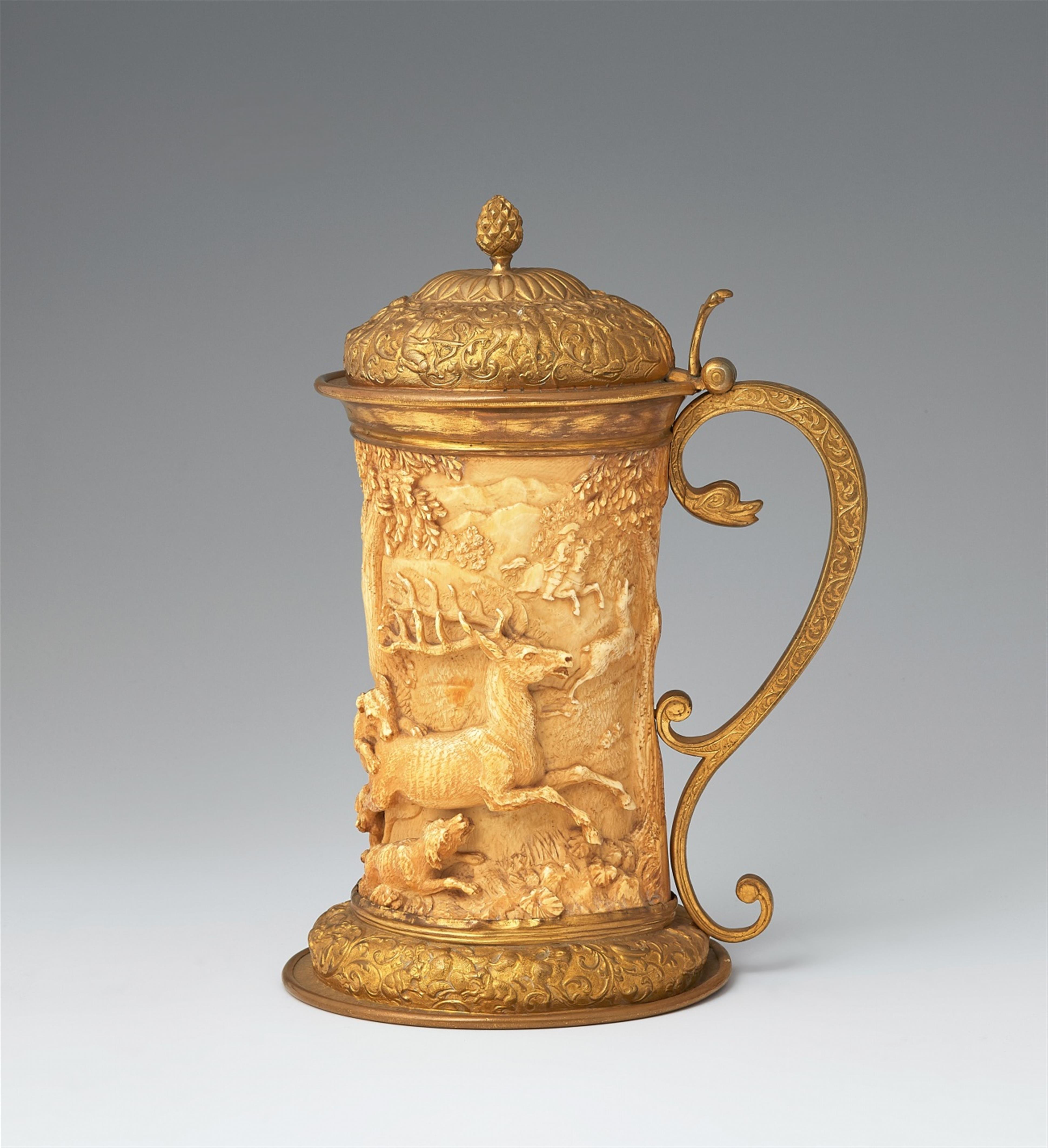 A metal-mounted ivory tankard with a stag hunt - image-1