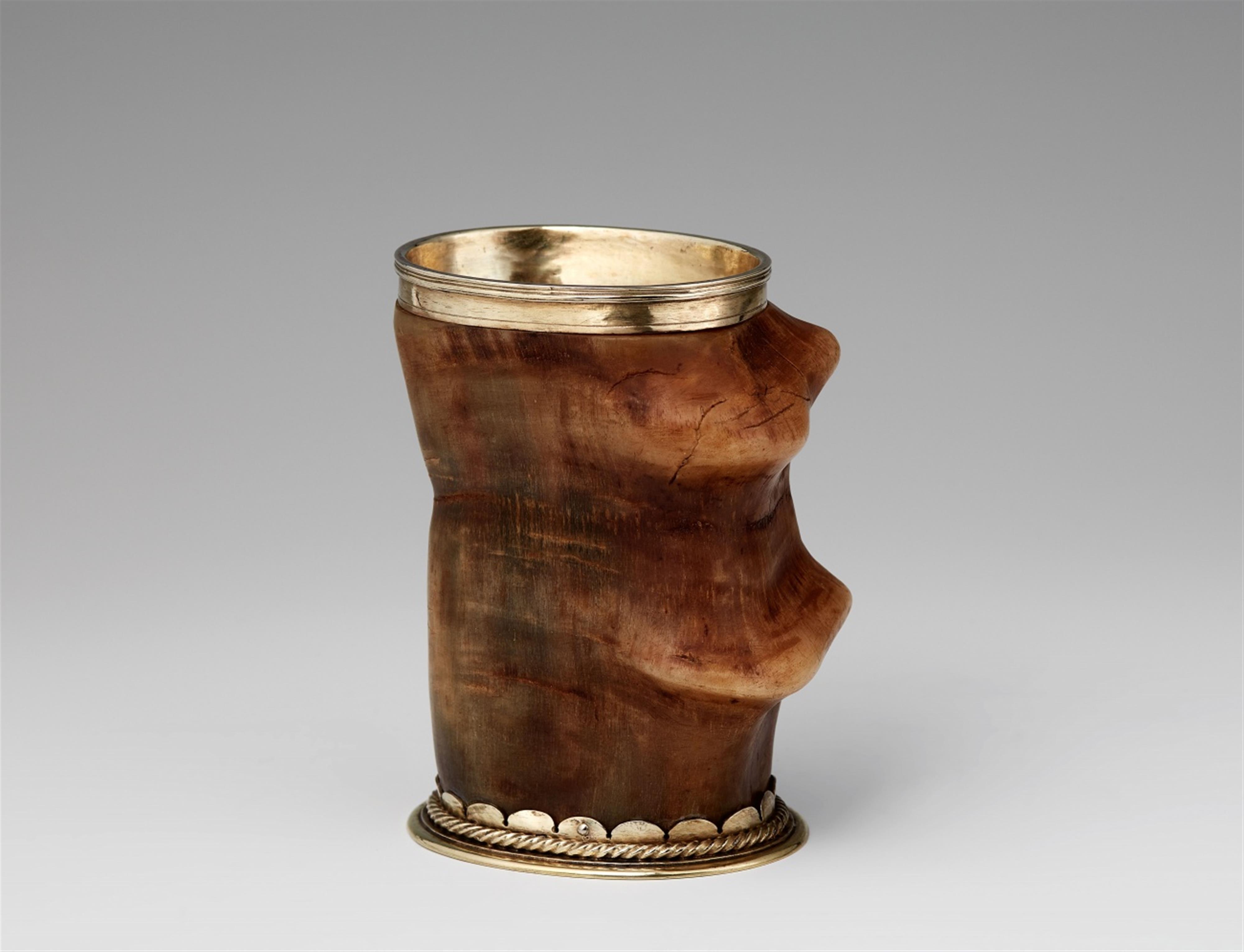 A silver-mounted goat's horn beaker - image-1