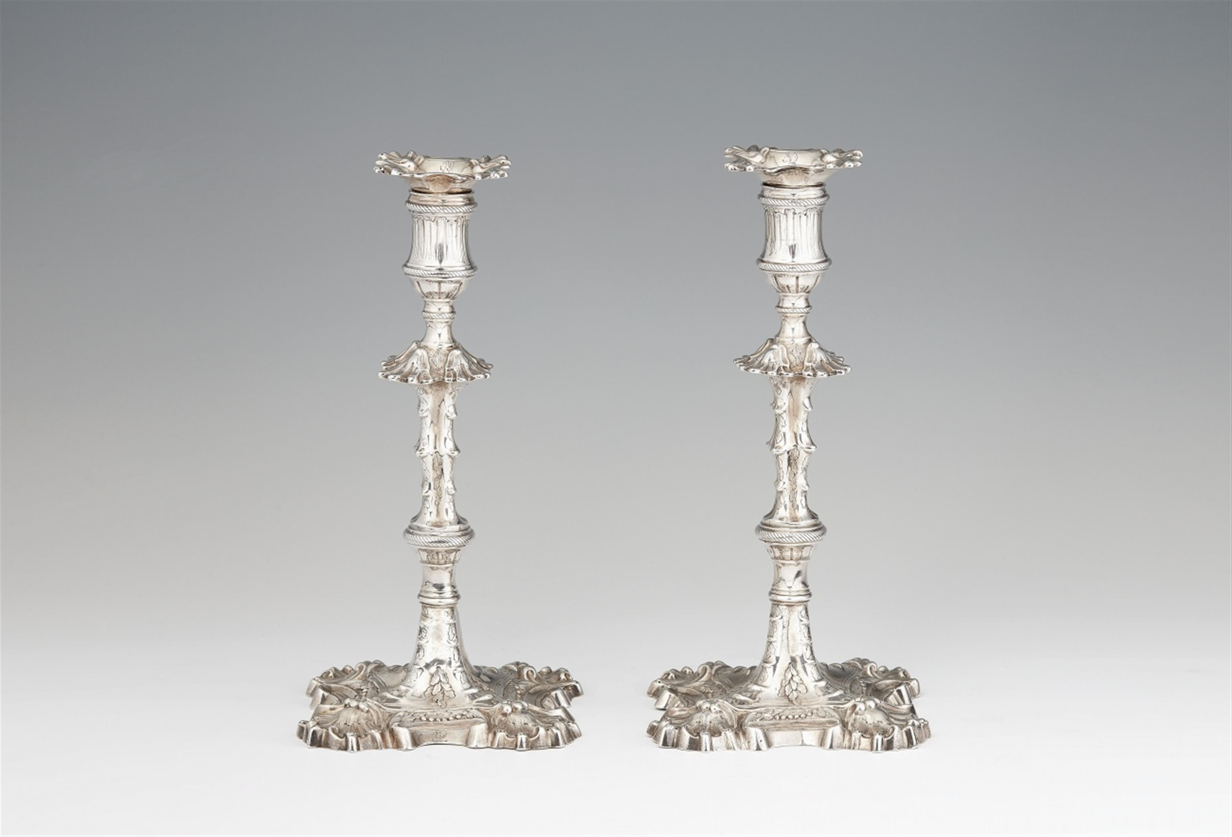 A pair of George II silver candlesticks - image-1