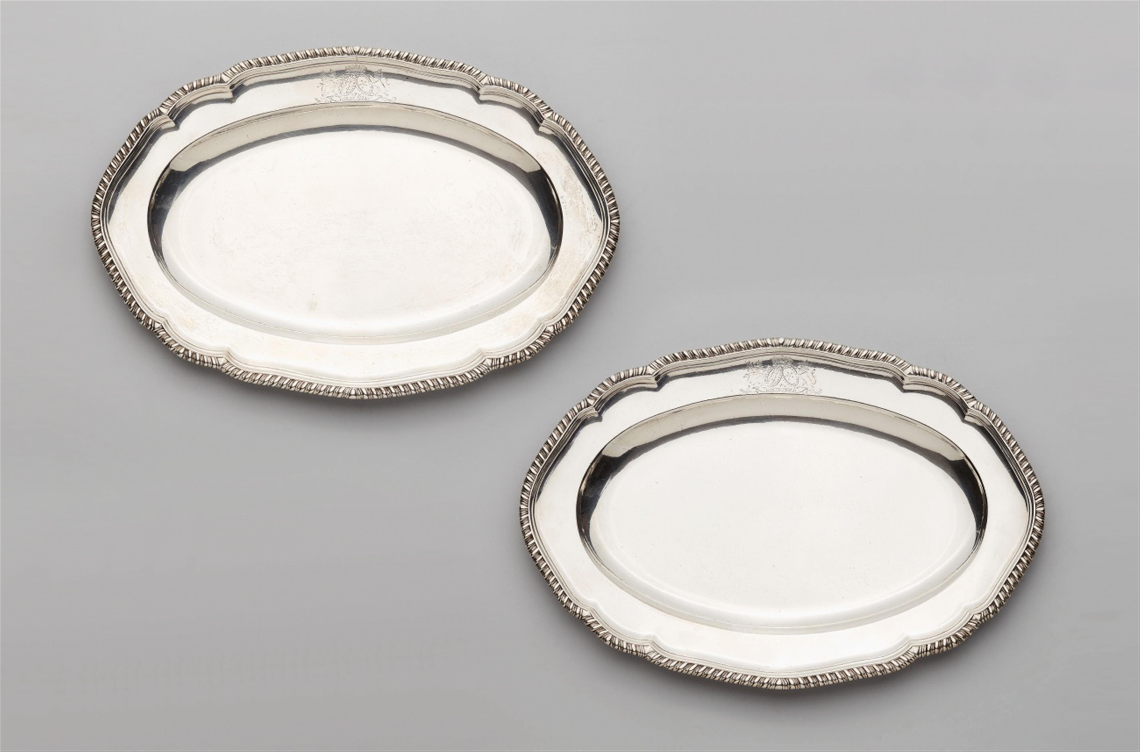 A pair of George III silver meat platters - image-1