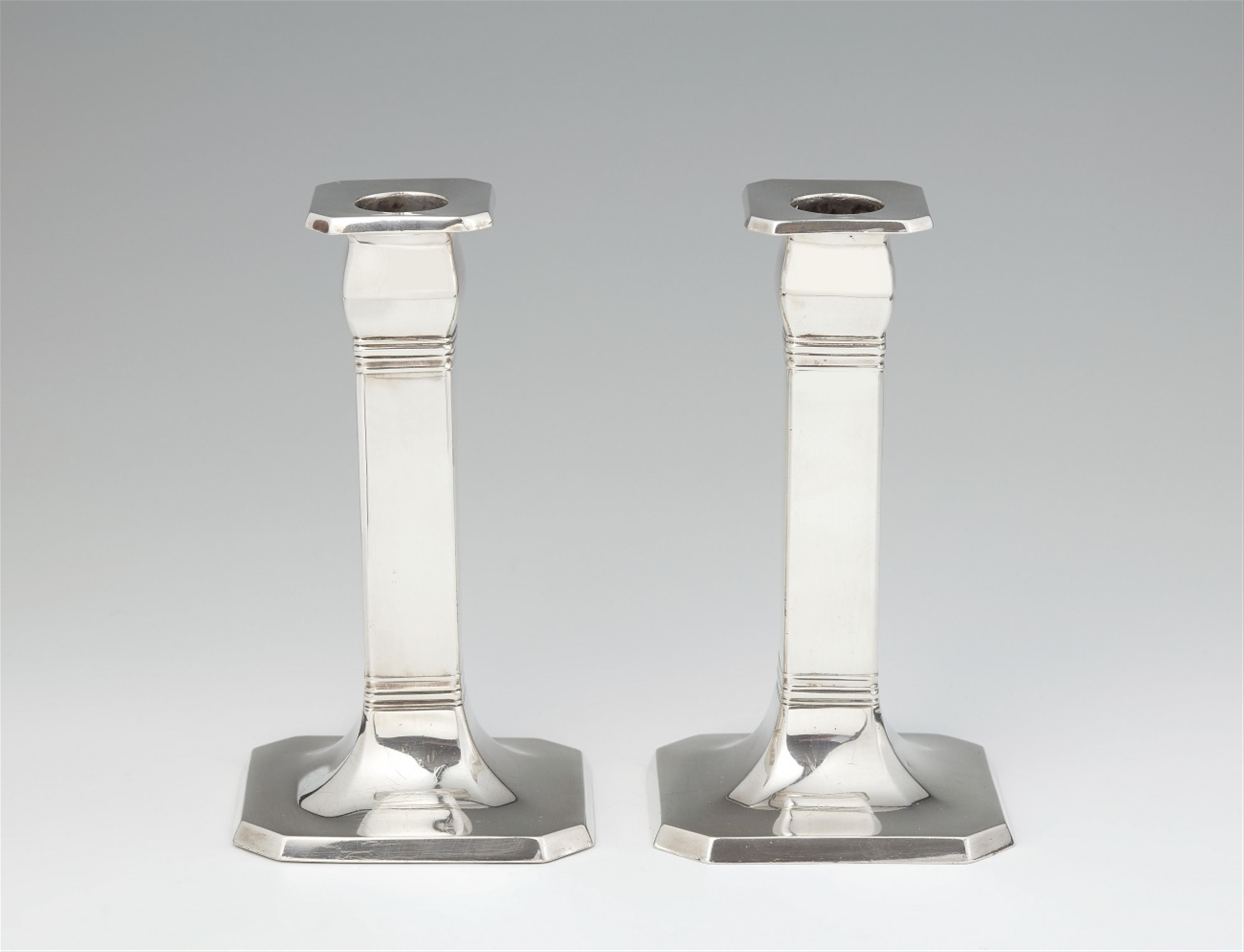 A pair of Art Deco Tiffany silver candlesticks - image-1