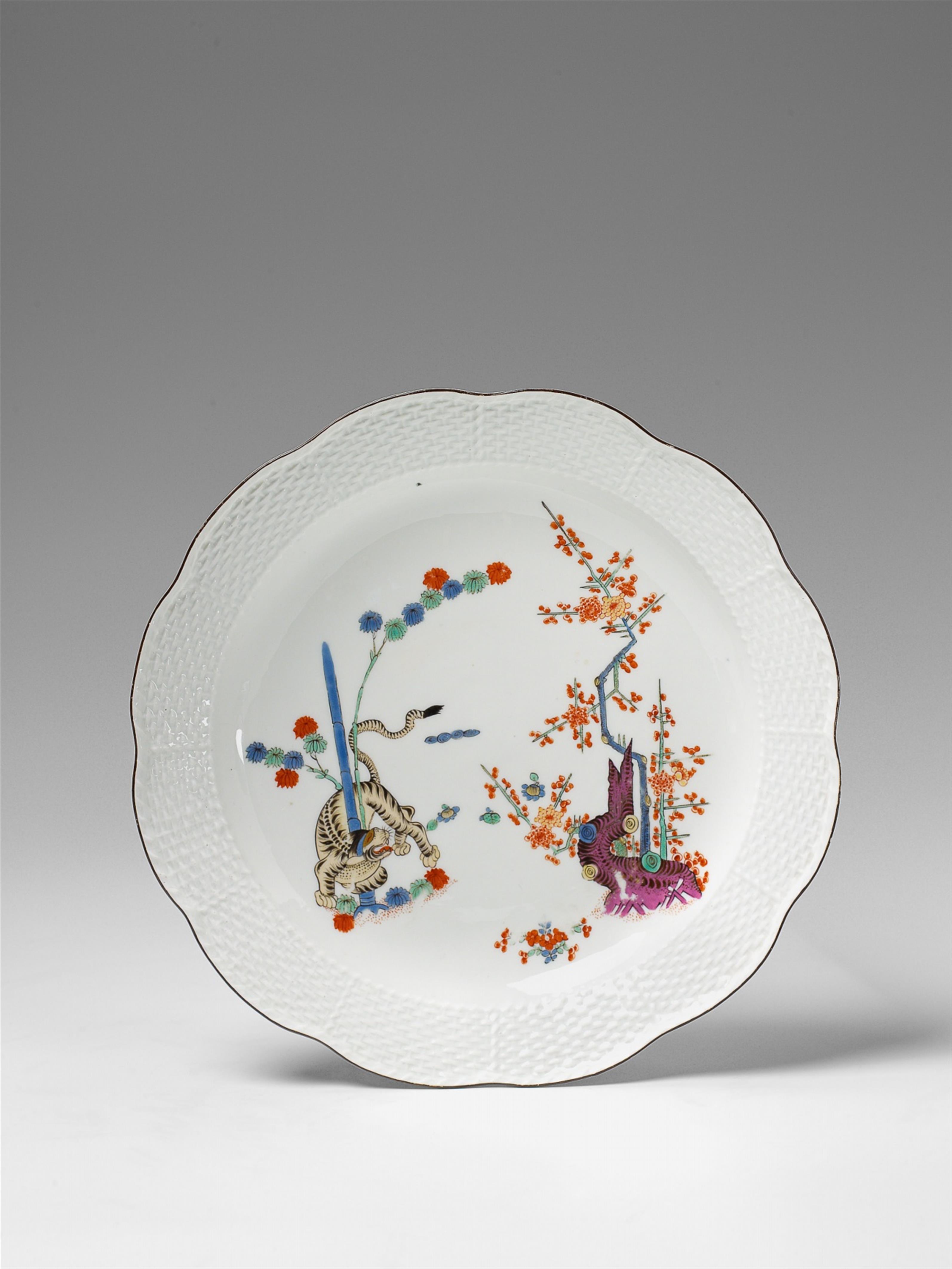 A Meissen porcelain bowl with yellow lion decor - image-1