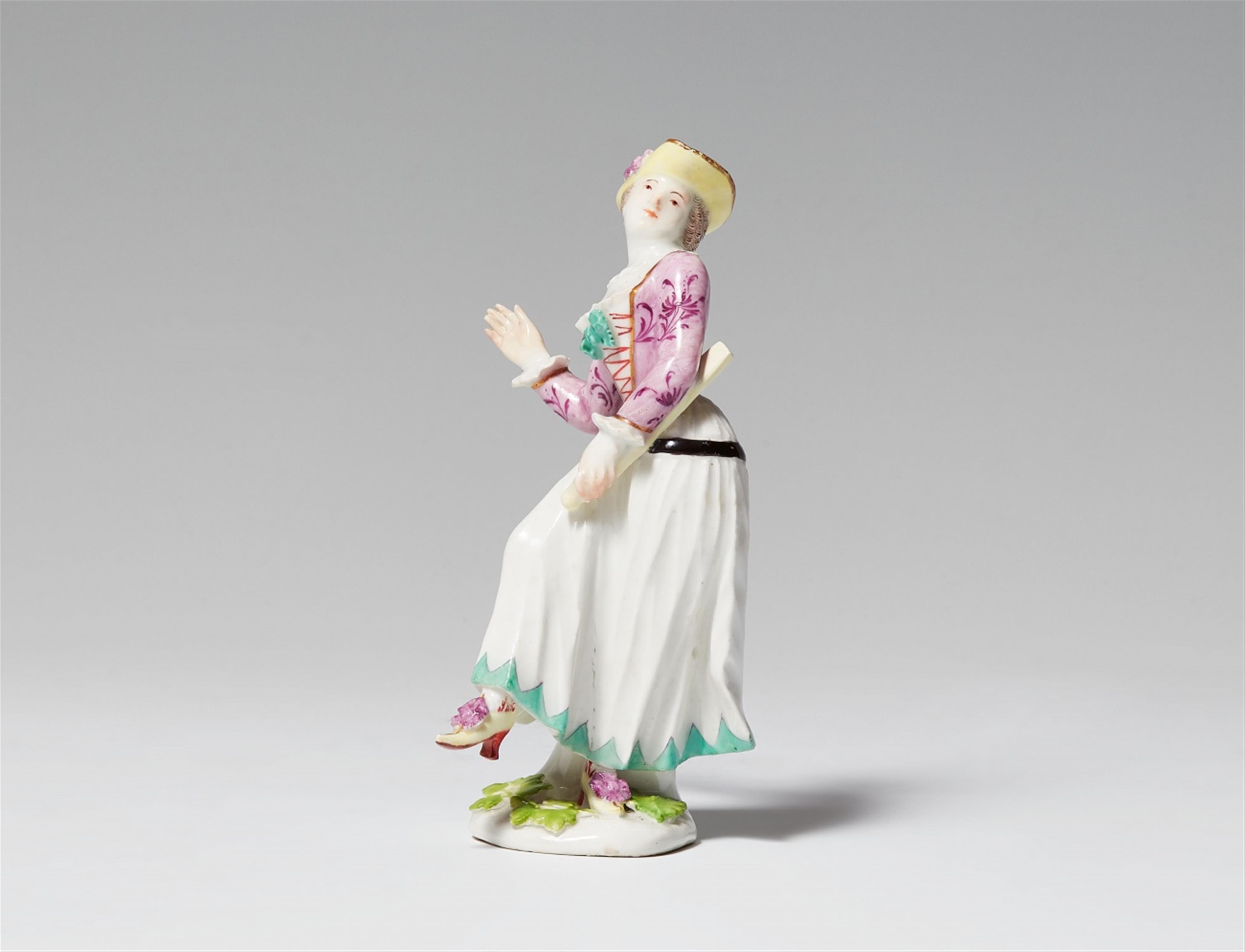 A Meissen porcelain figure of a dancing harlequin - image-1