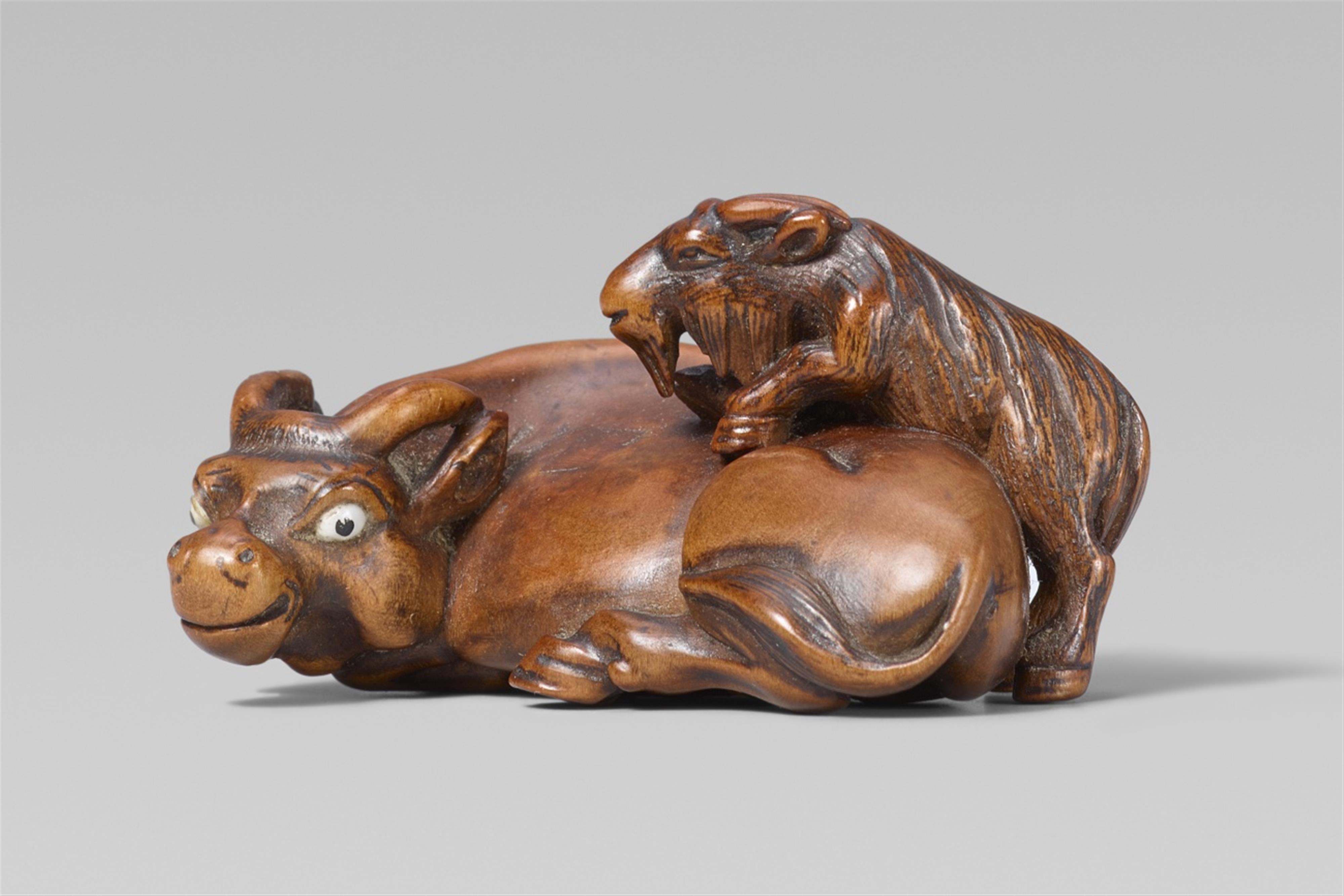 A fine and interesting Nagoya wood netsuke of an ox and a goat, by Masayoshi. Mid-19th century - image-1