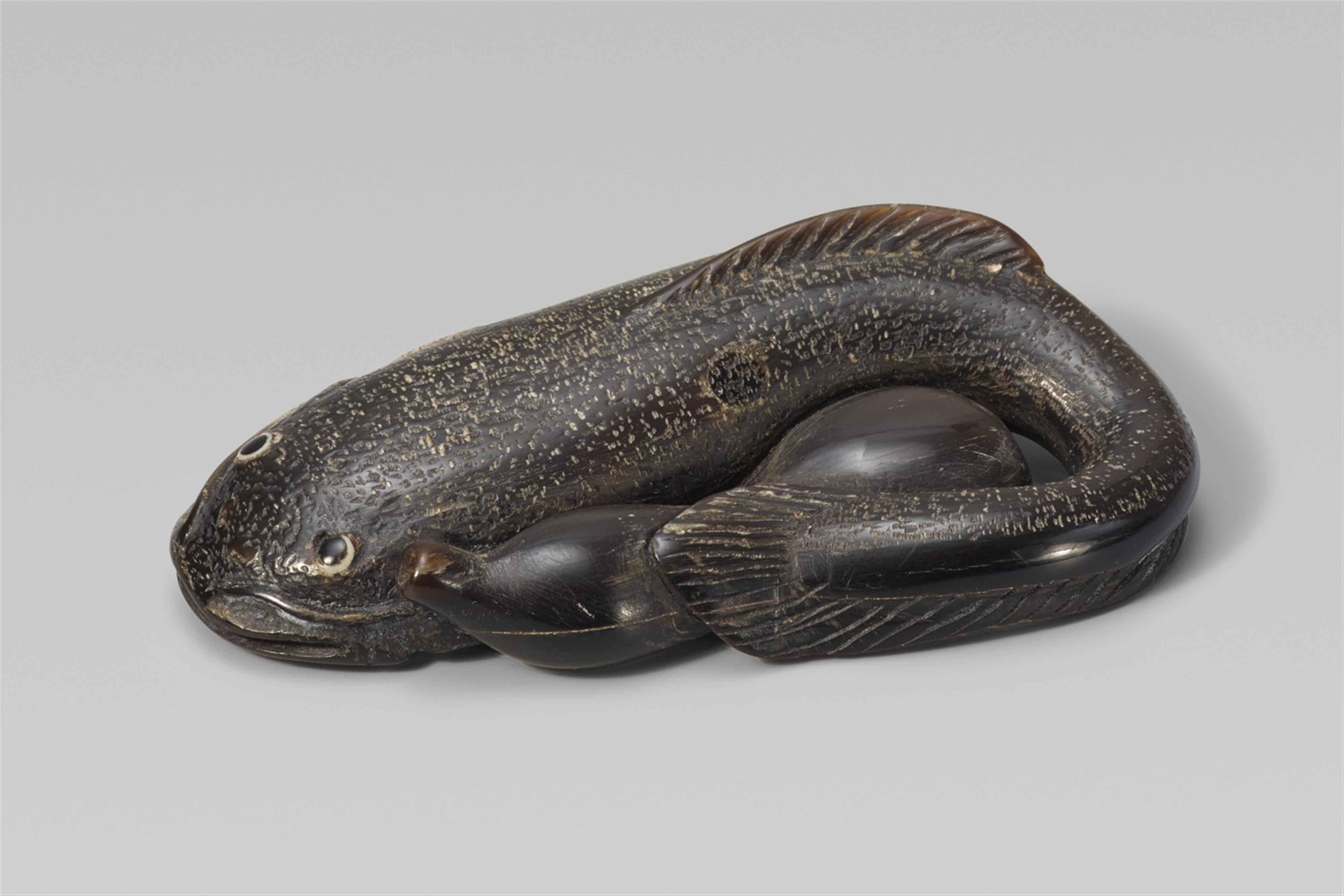 An unusual and interesting greyish horn netsuke of a catfish and a gourd. Second half 19th century - image-1