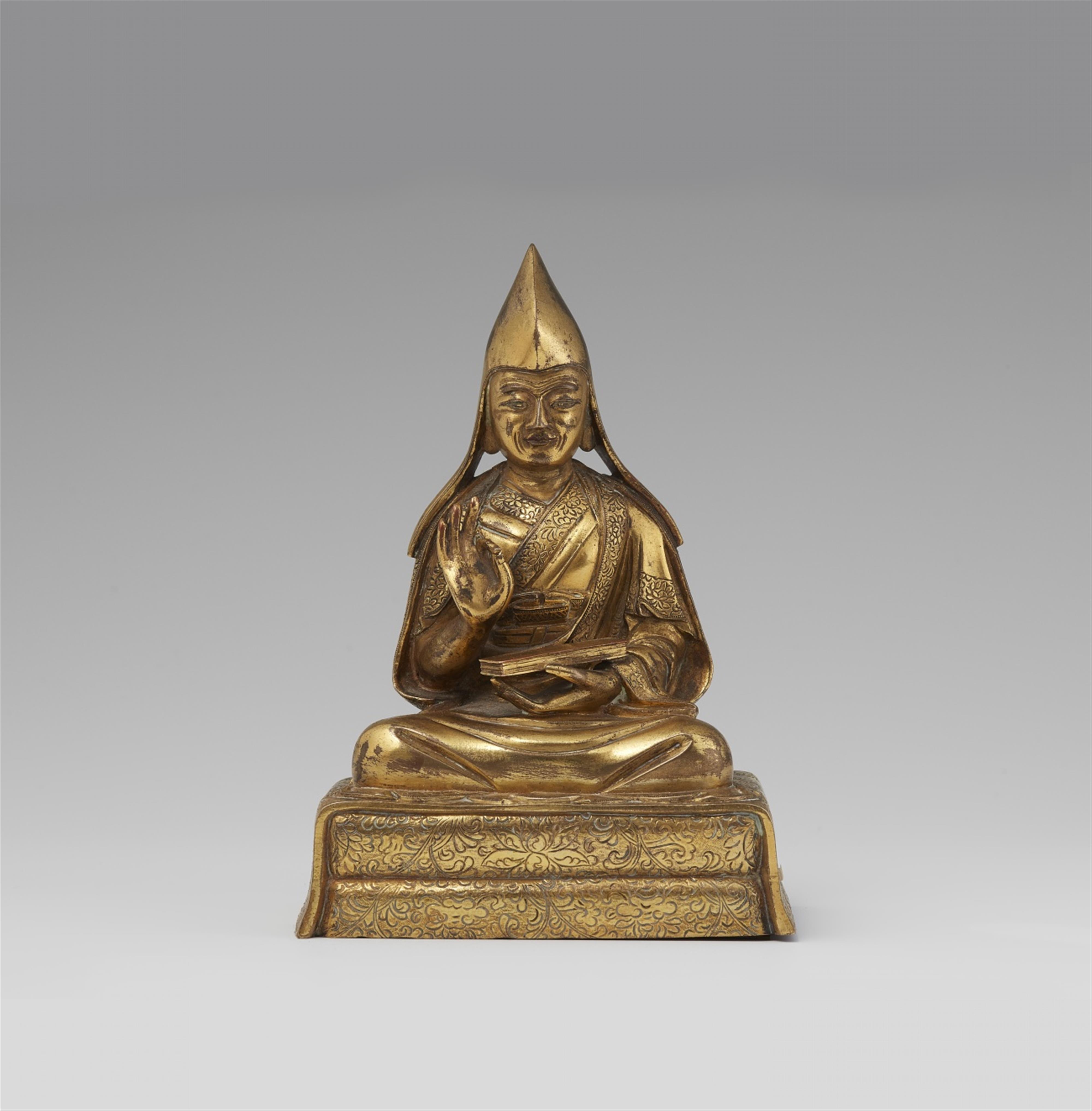 A Sinotibetan gilt bronze figure of a Gelugpa lama. 18th century - image-1