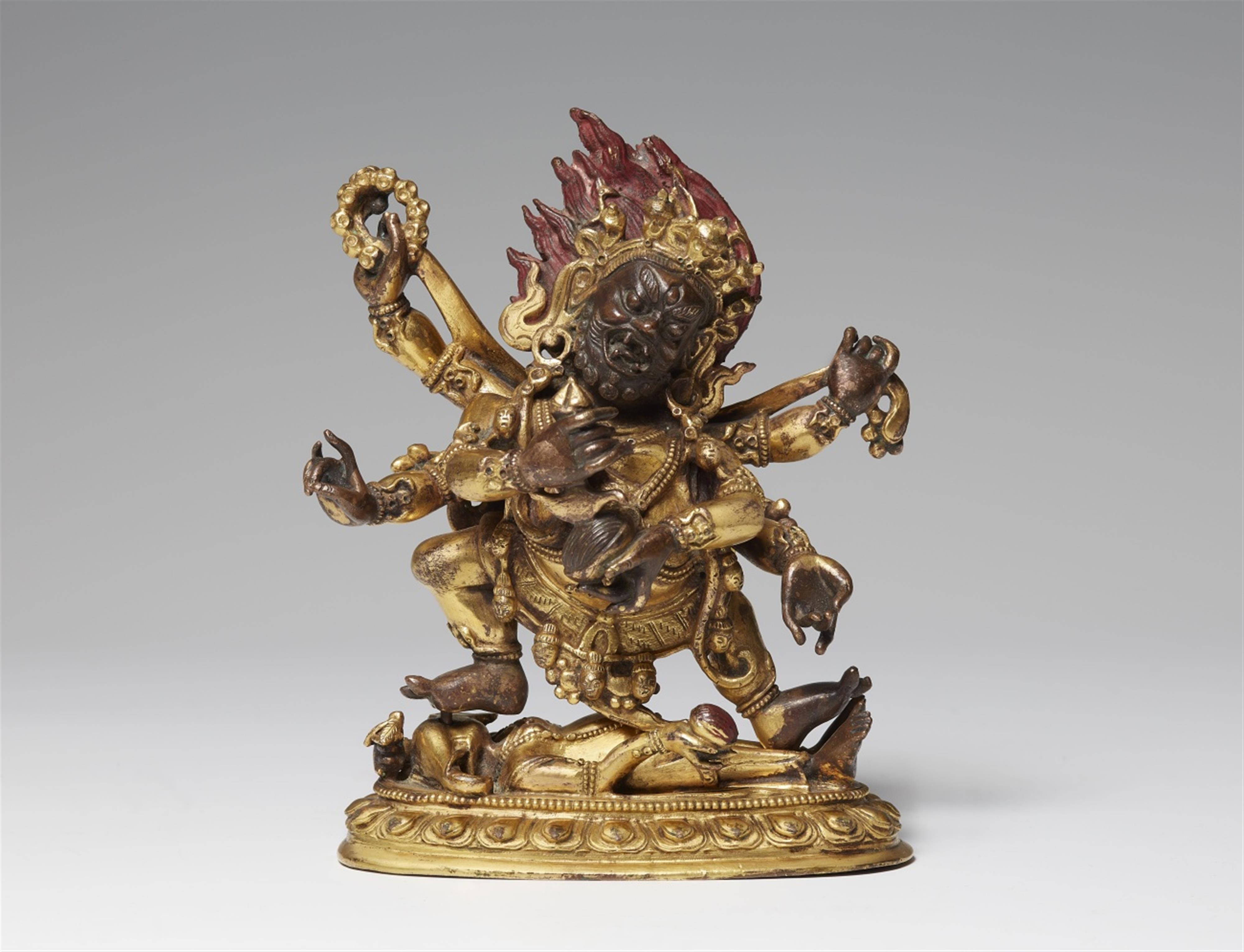A Sinotibetan gilt bronze figure of Mahakala. 19th century - image-1