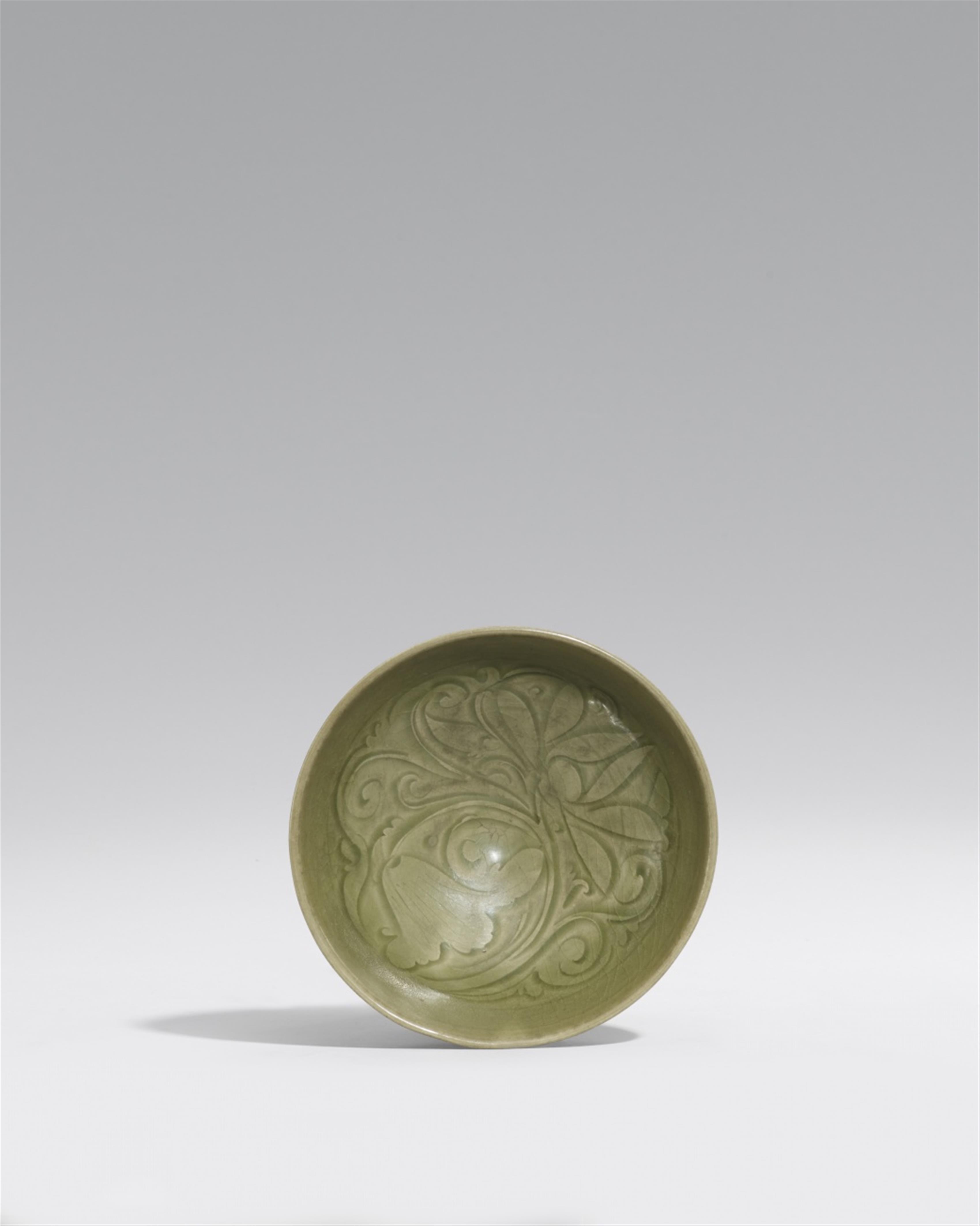 A Yaozhou celadon carved bowl. Northern Song dynasty (960-1127) - image-1
