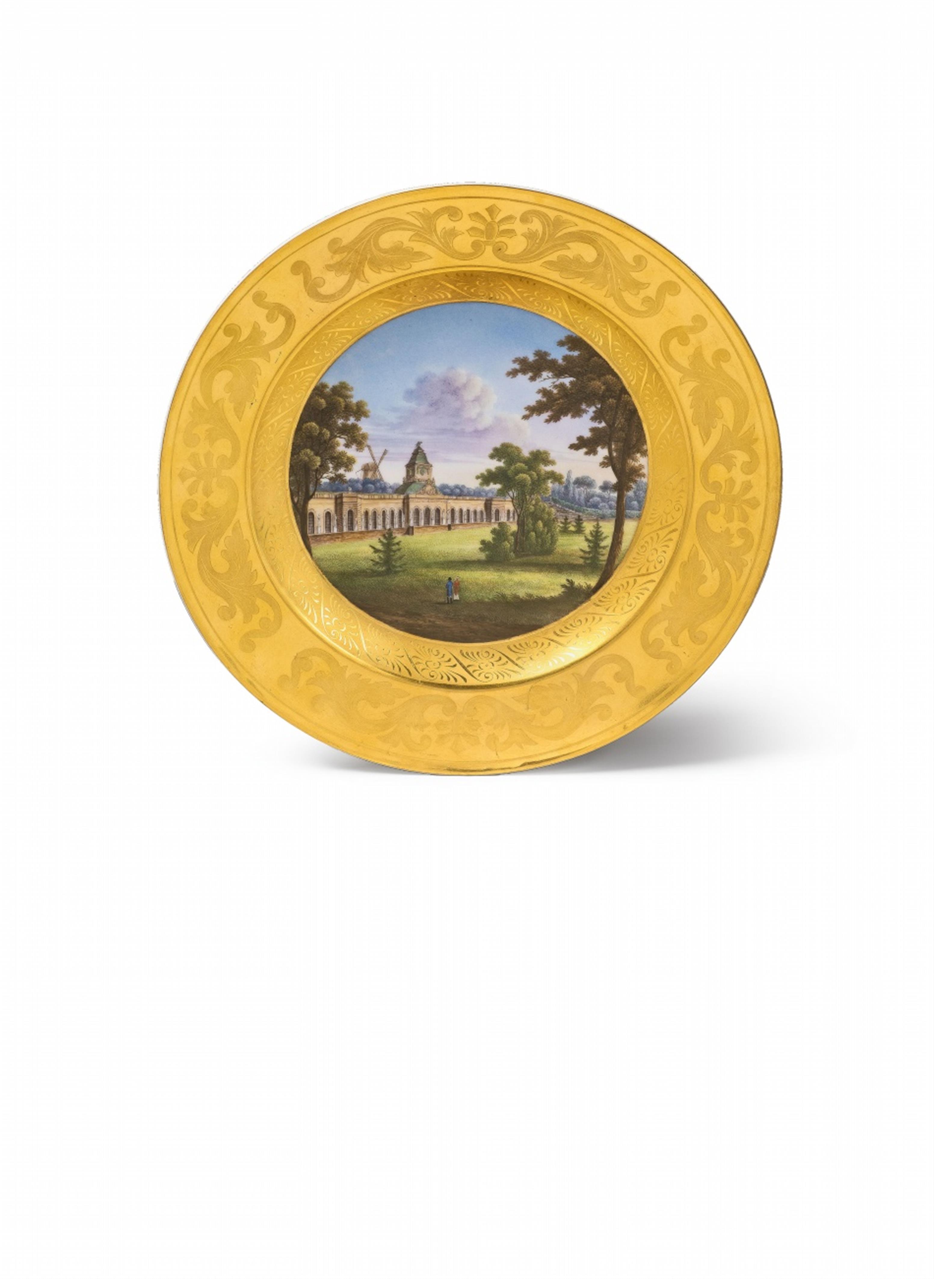A Berlin KPM porcelain plate with a view of the Neue Kammern in Sanssouci - image-1
