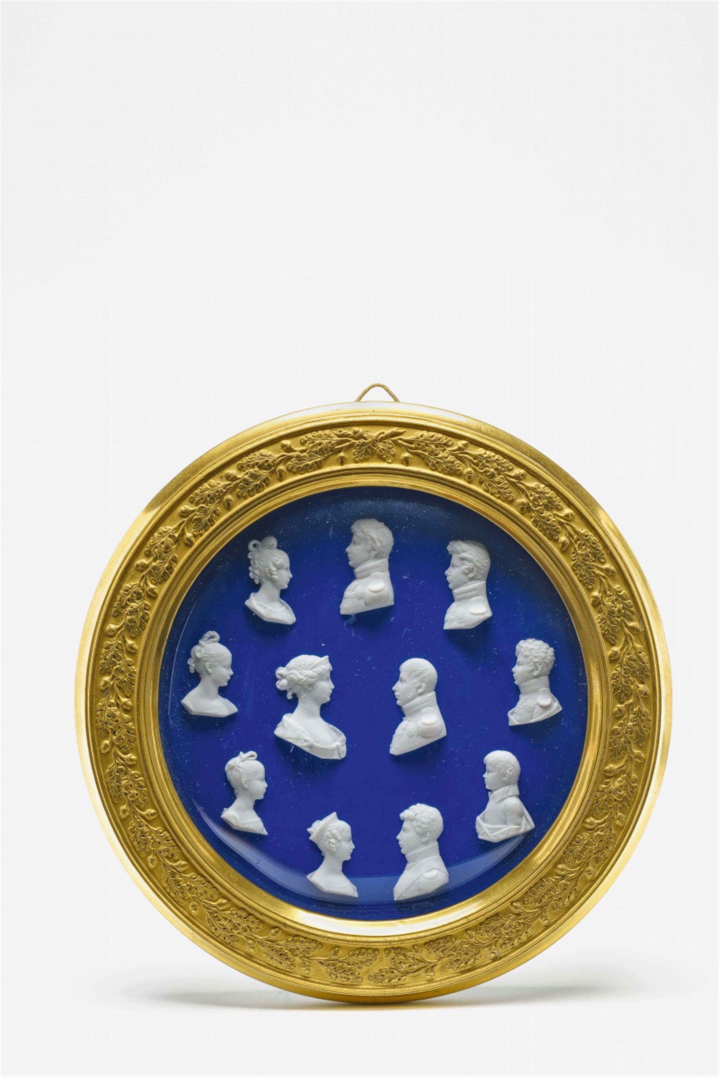 A Berlin KPM porcelain tondo with relief busts of the Prussian royal family - image-1