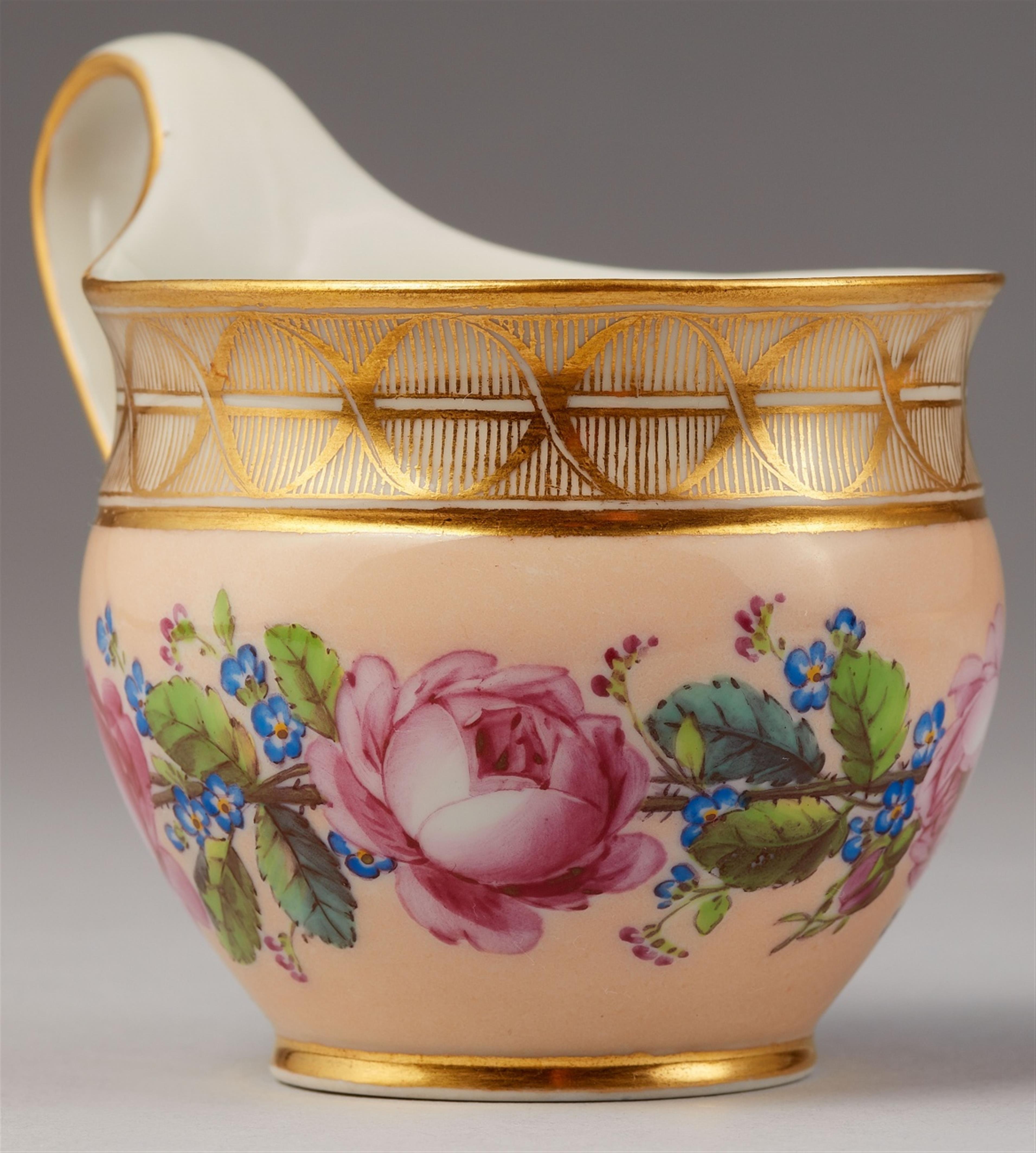 A Berlin KPM porcelain cup and saucer with roses and forget-me-nots - image-2