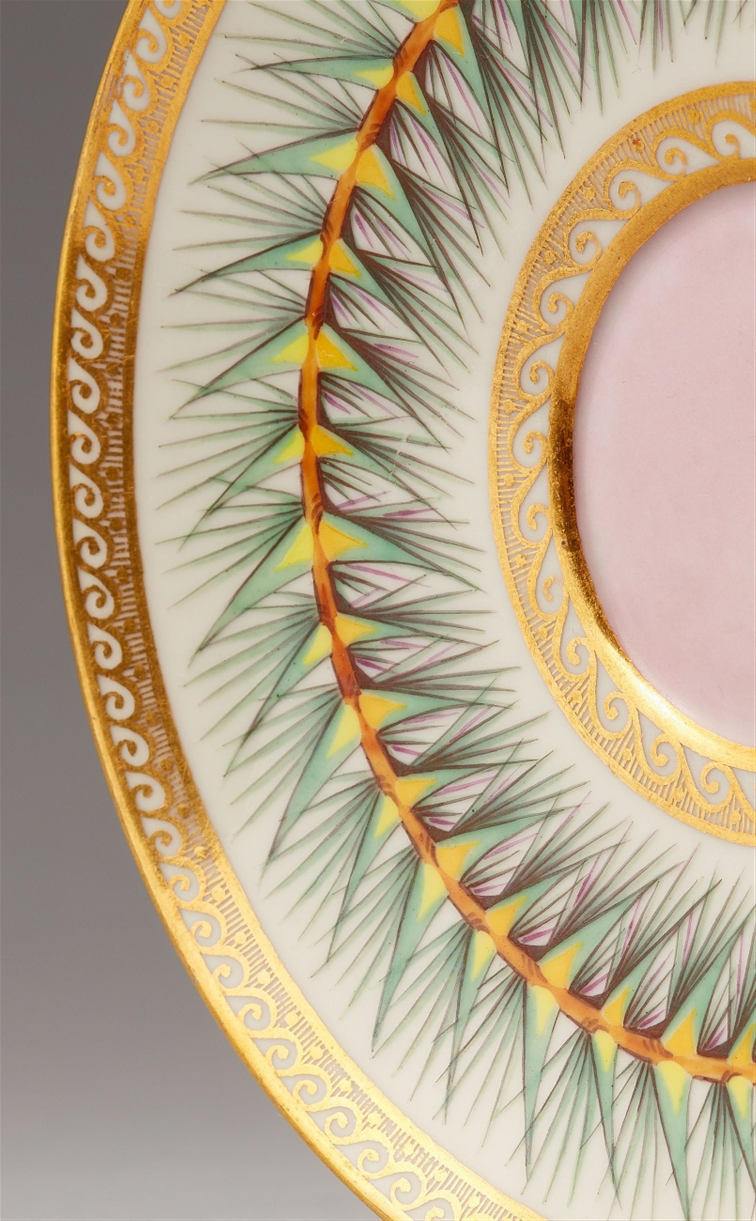 A Berlin KPM porcelain cup and saucer with pine branches - image-2