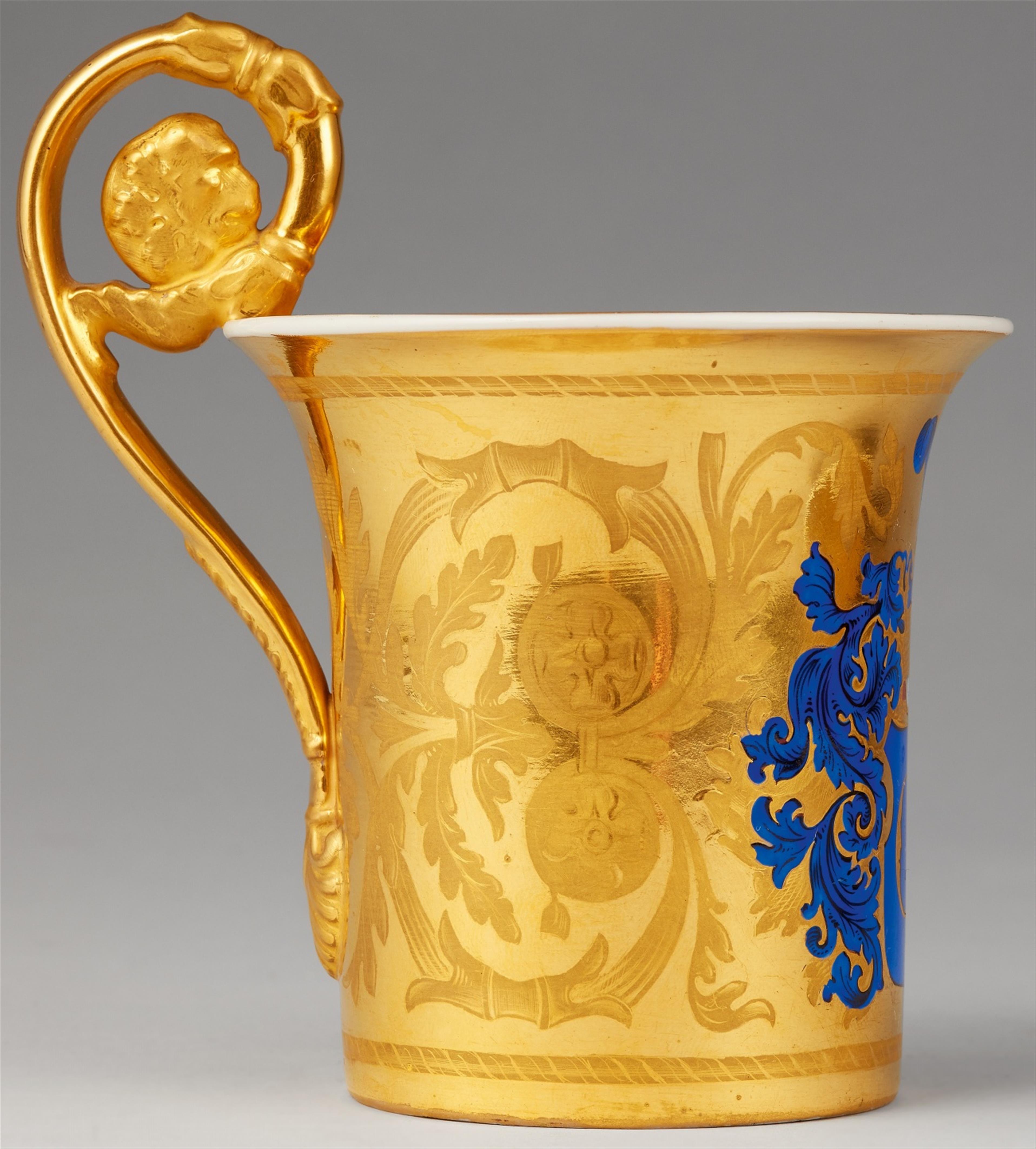 A Berlin KPM porcelain cup and an earlier saucer - image-2