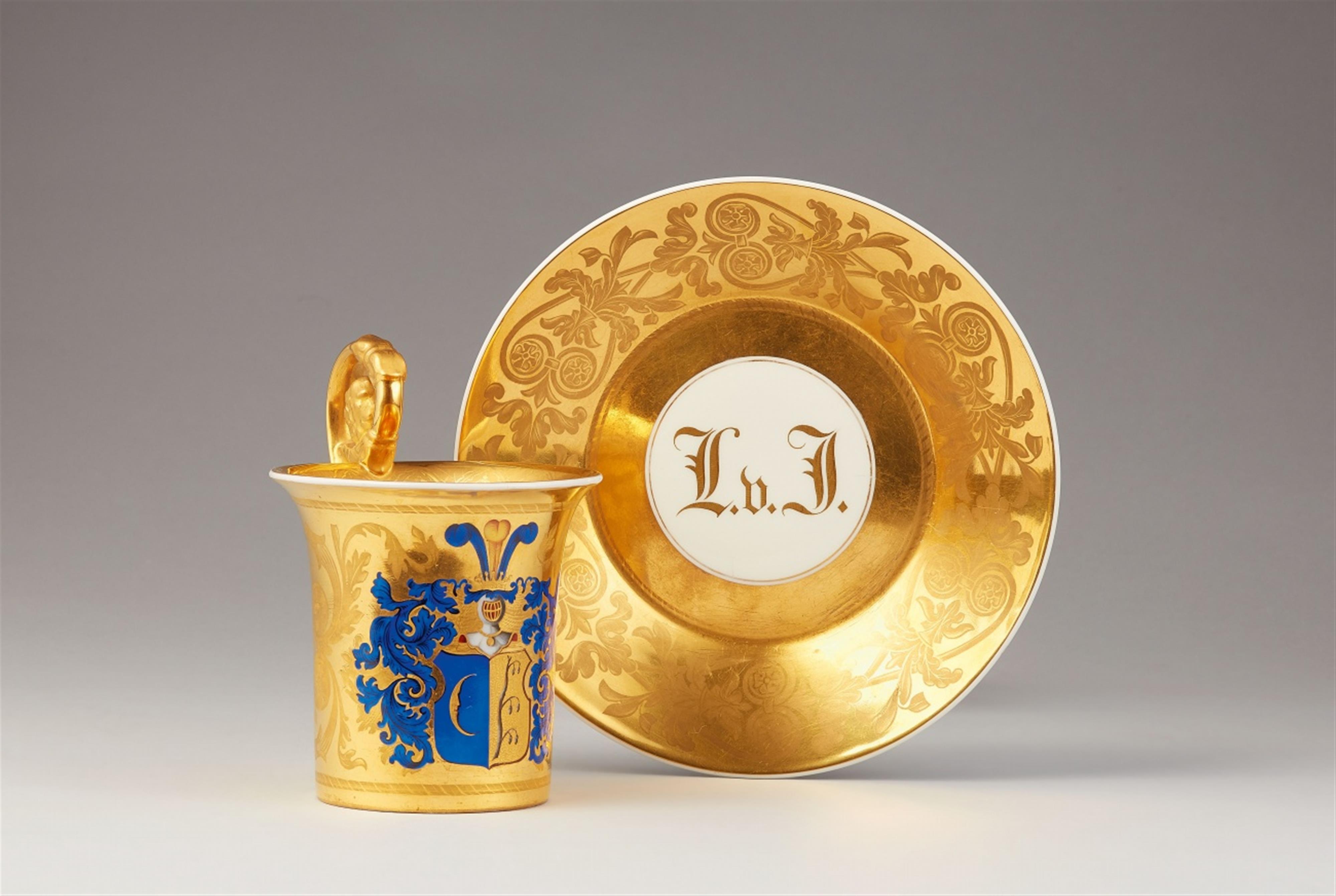 A Berlin KPM porcelain cup and an earlier saucer - image-1