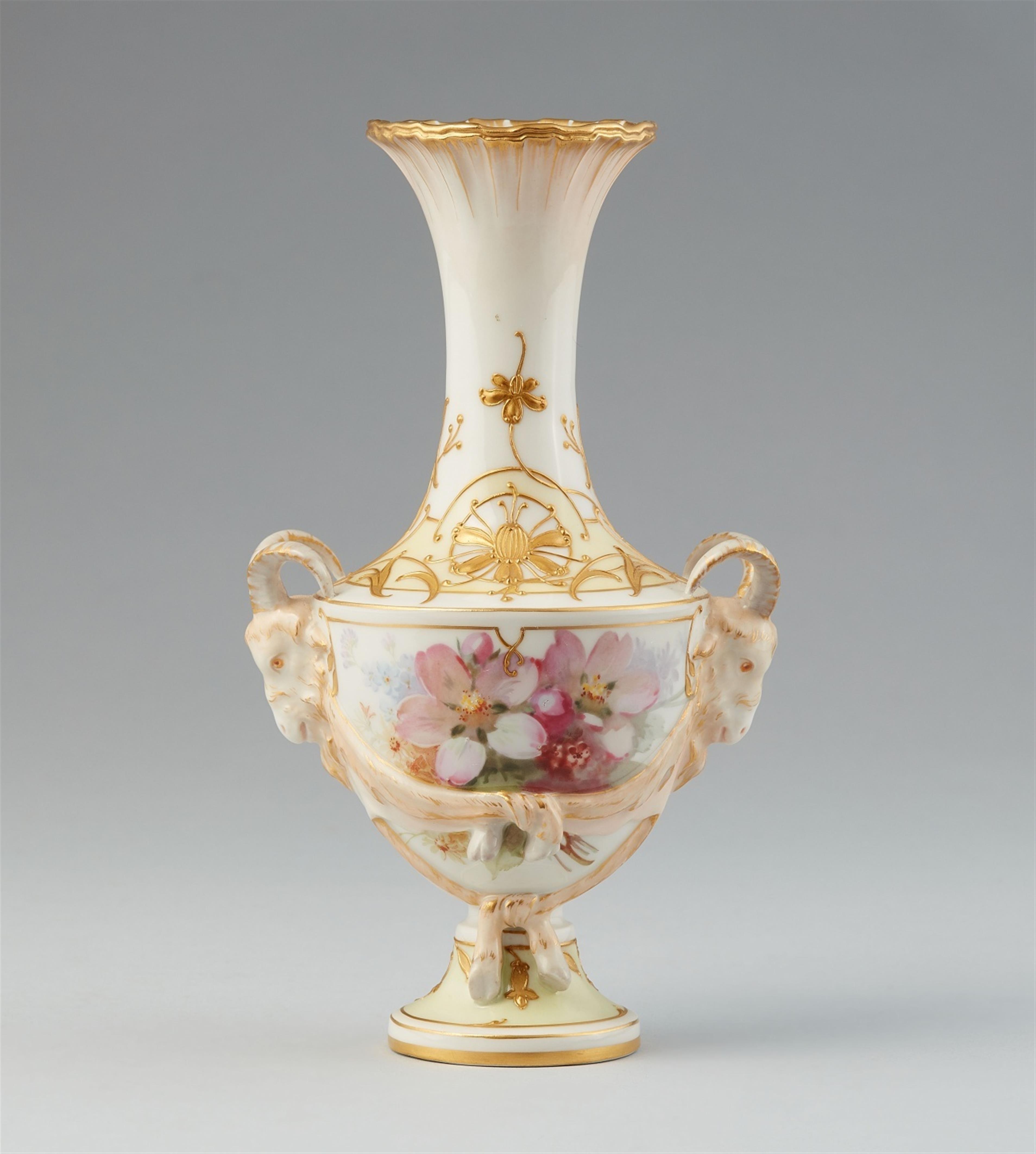 A Berlin KPM porcelain vase with ram's heads - image-1