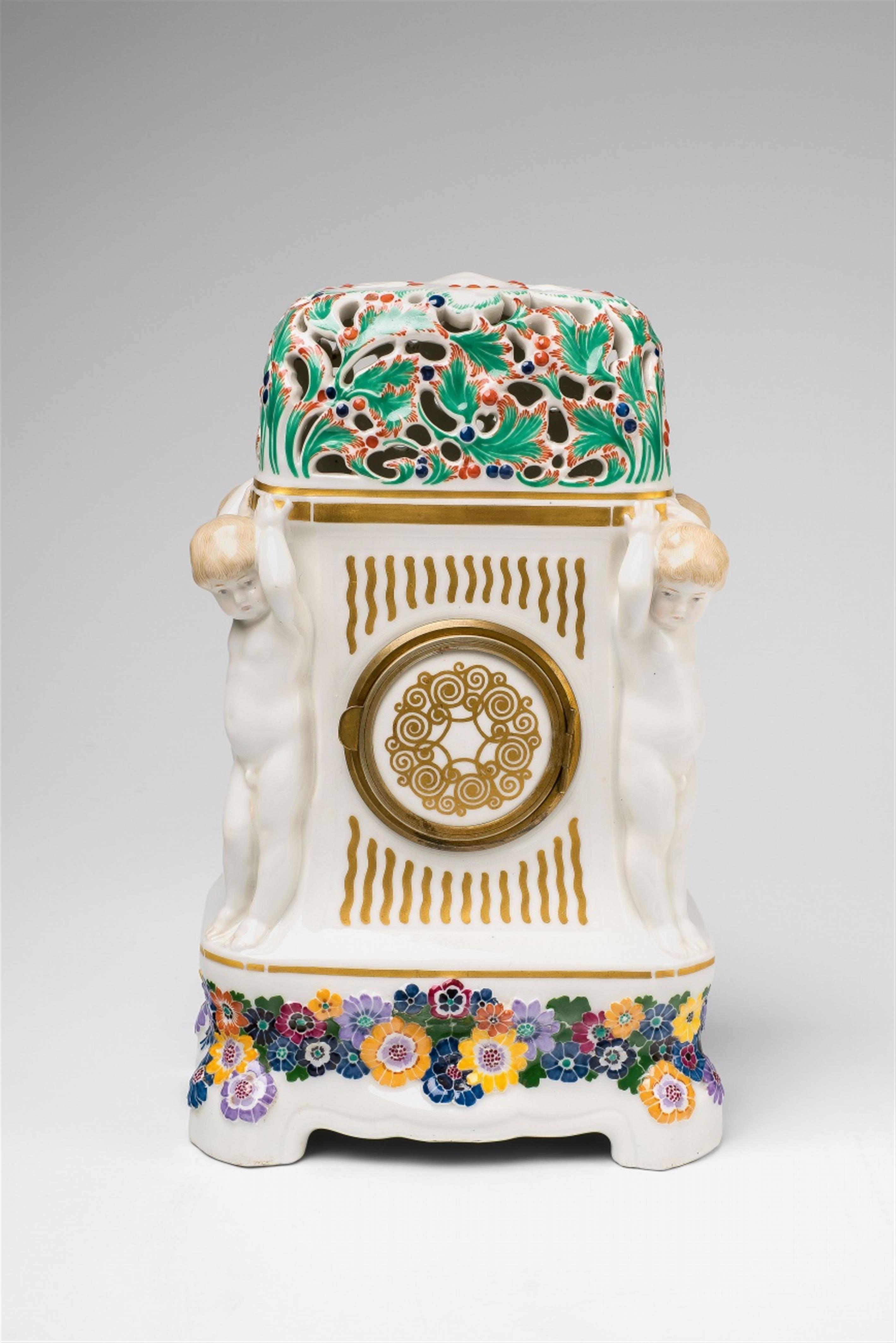 A Berlin KPM Jugendstil porcelain mantle clock with putti - image-2