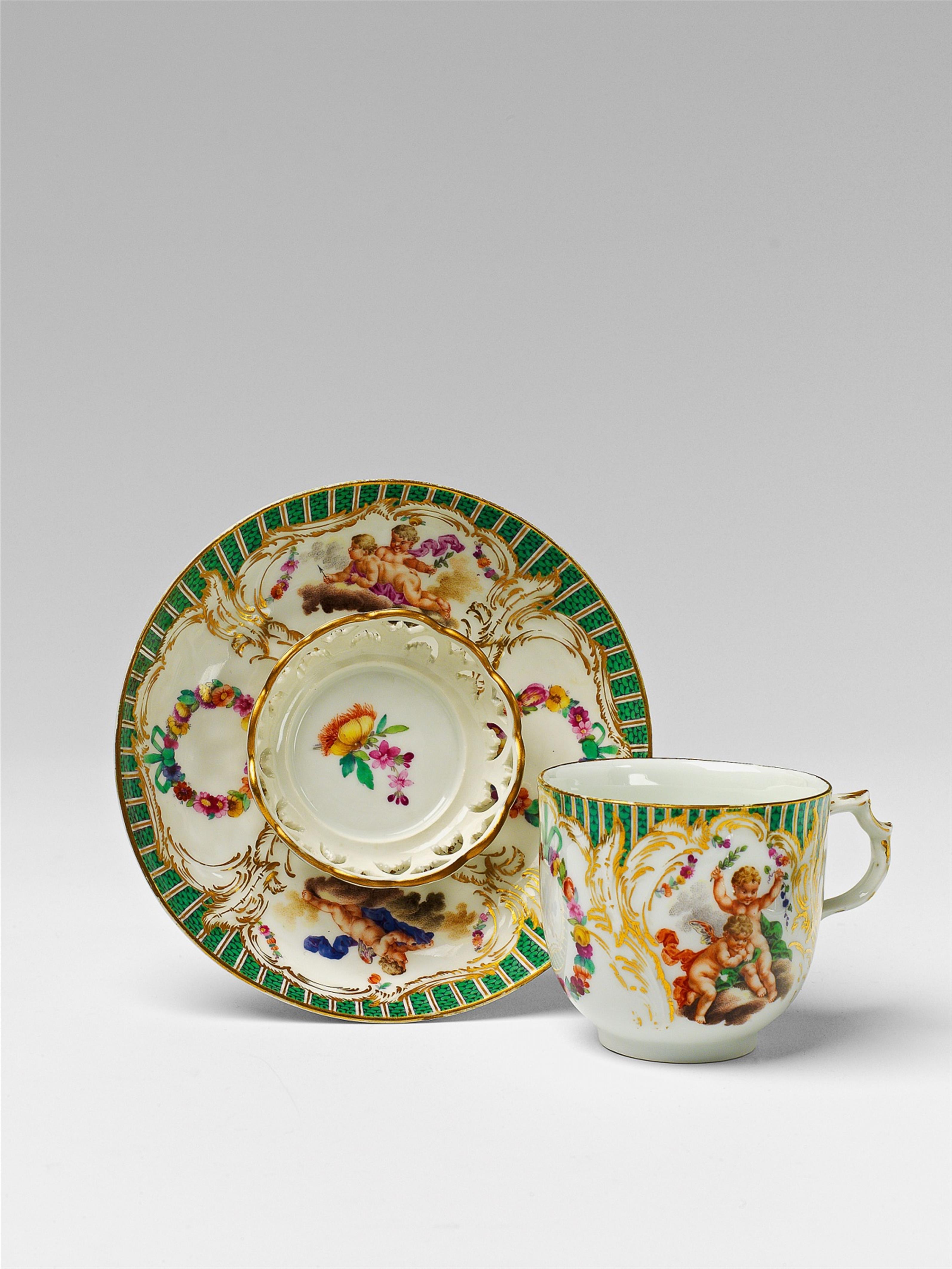 An early Berlin KPM porcelain trembleuse with putti - image-1