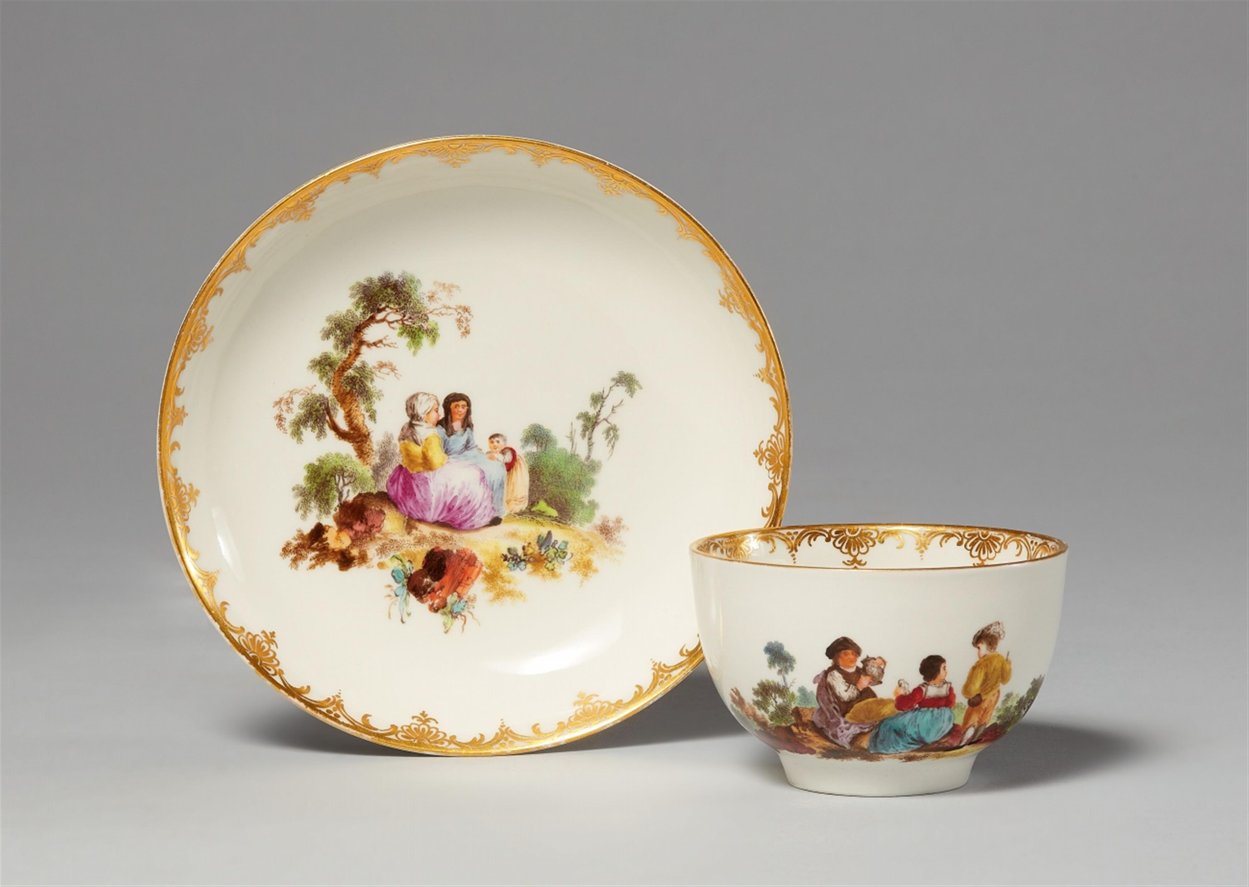 A Berlin KPM porcelain cup and saucer with a scene after Teniers - image-1