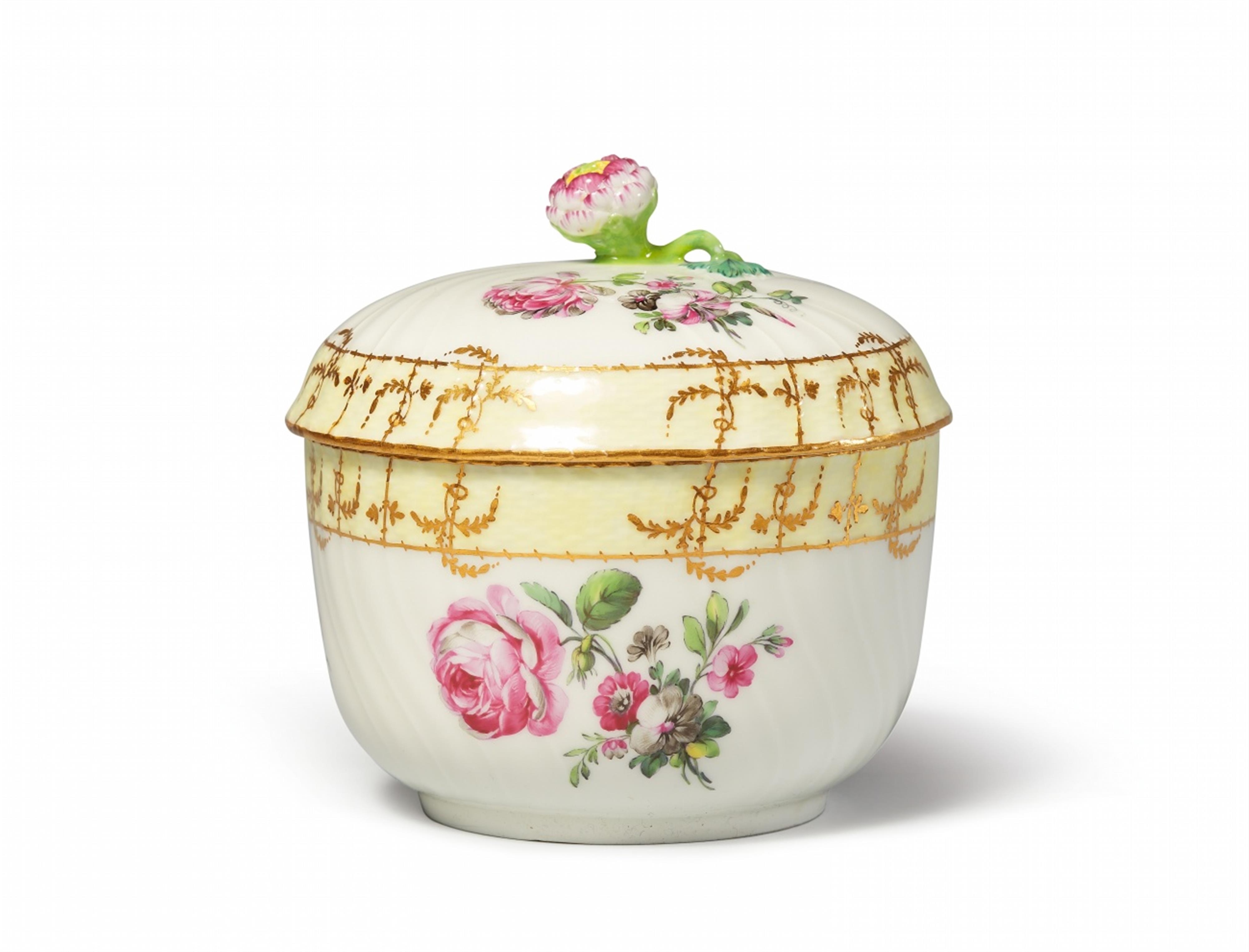 A Berlin KPM porcelain sugar box with tri-coloured flowers - image-1