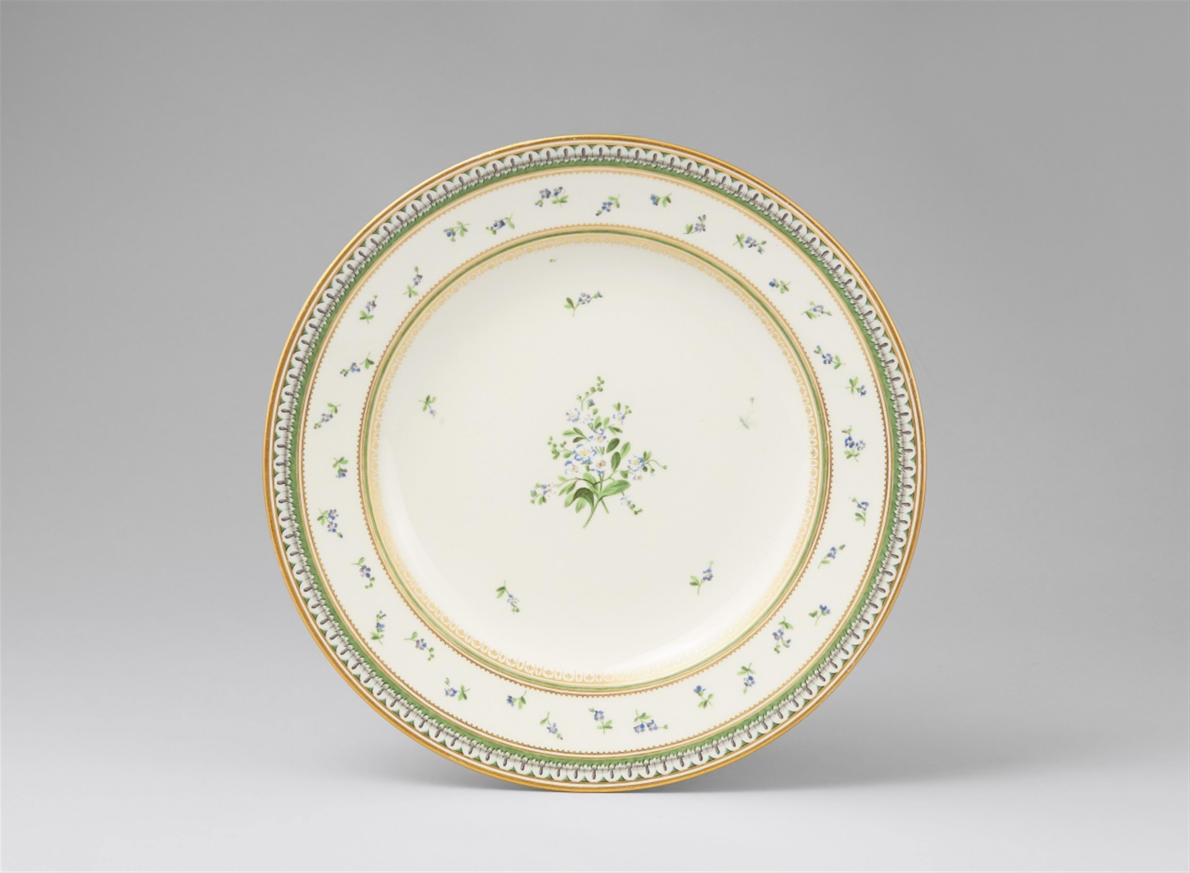 A Vienna porcelain cup and saucer with forget-me-nots - image-1