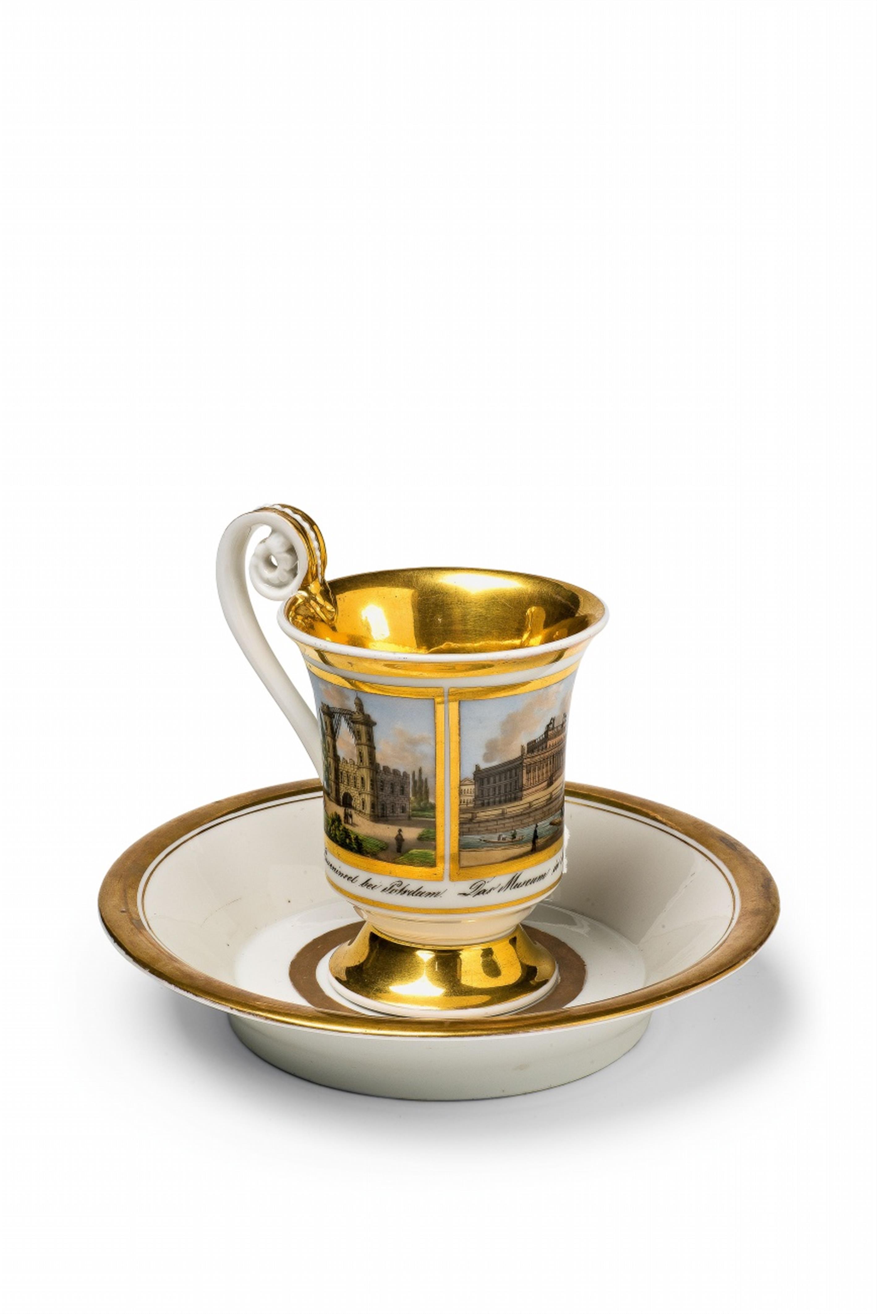 A Berlin KPM porcelain cup and saucer with three views of Berlin - image-1