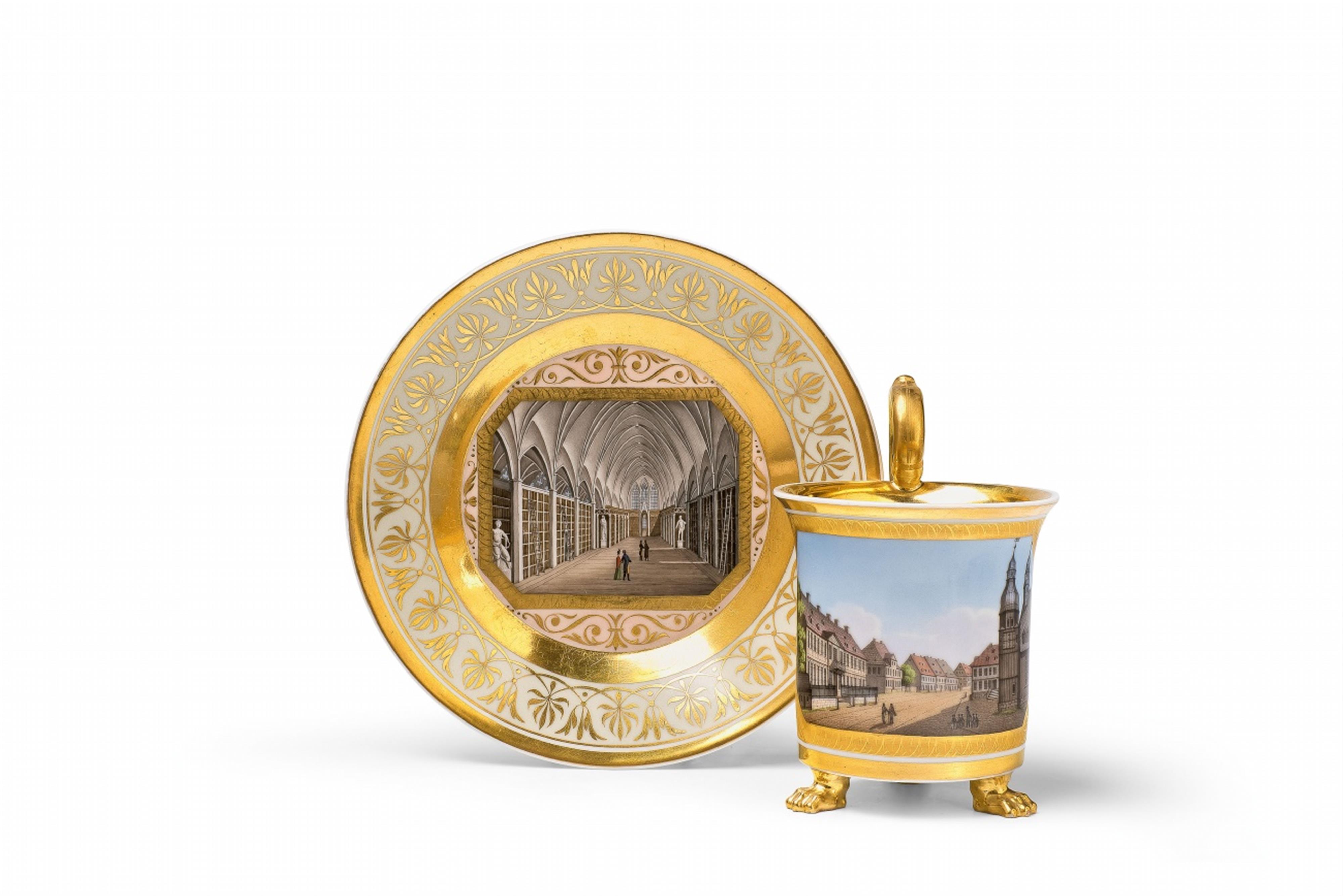 A Berlin KPM porcelain cup and saucer with views of Lower Saxony - image-1