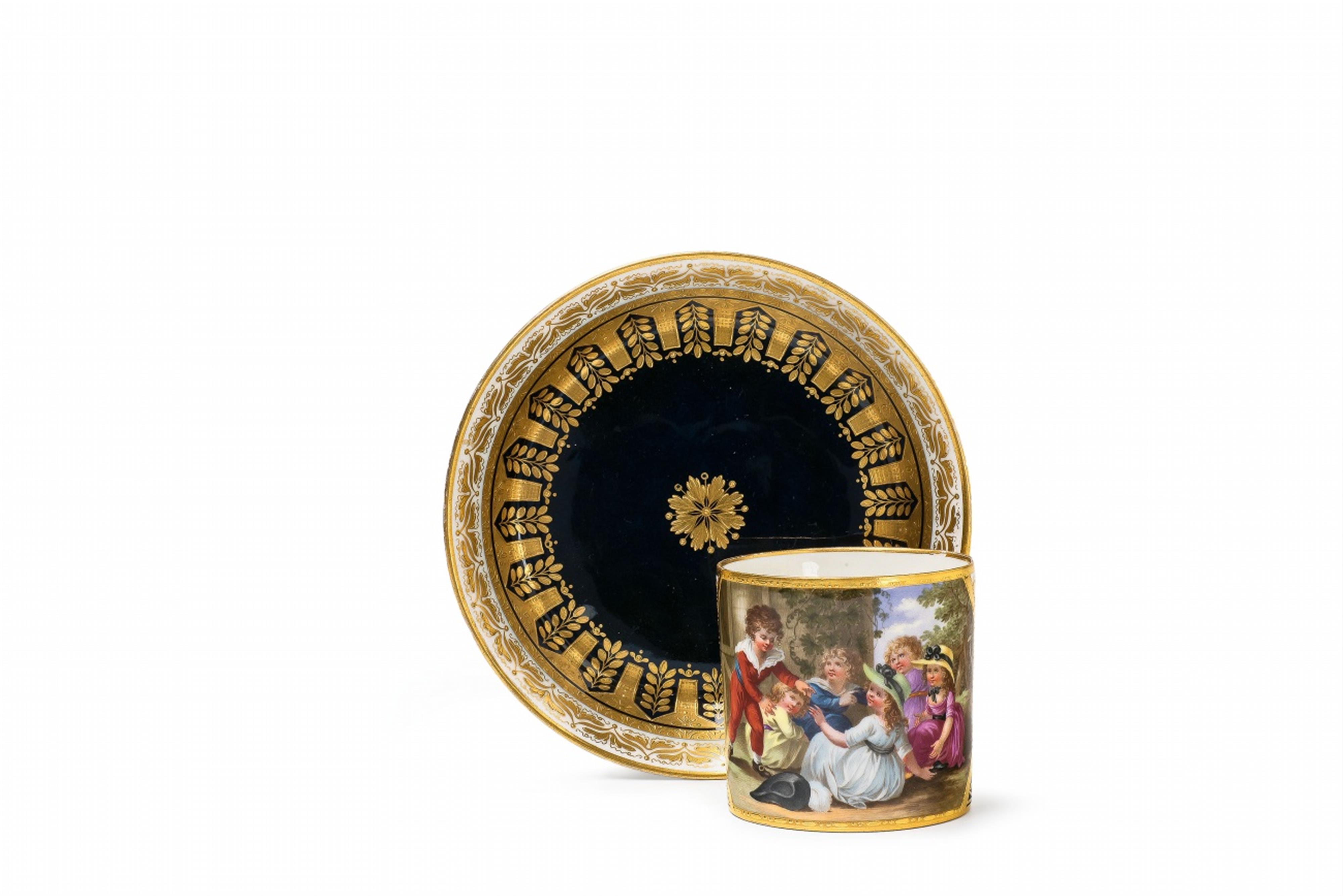 A Vienna porcelain cup and saucer with children playing - image-1