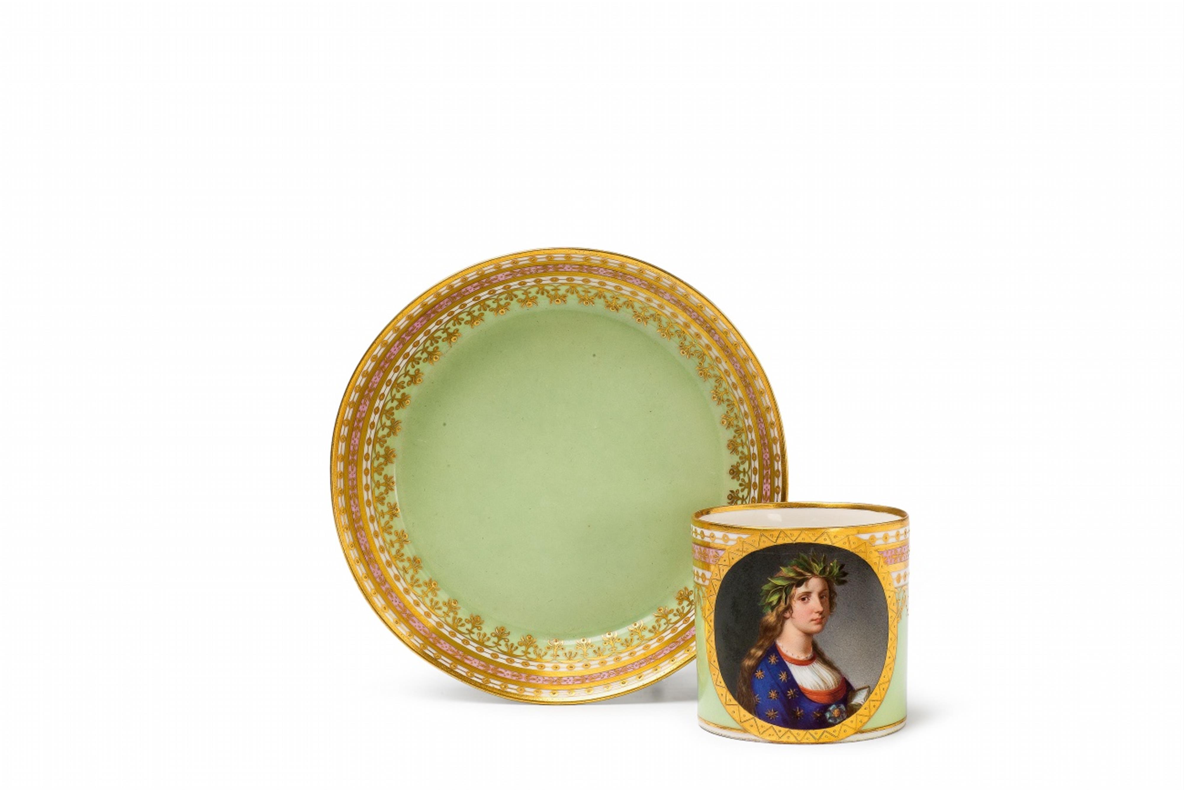 A Vienna porcelain cup and saucer with a portrait of a young woman as Clio - image-1
