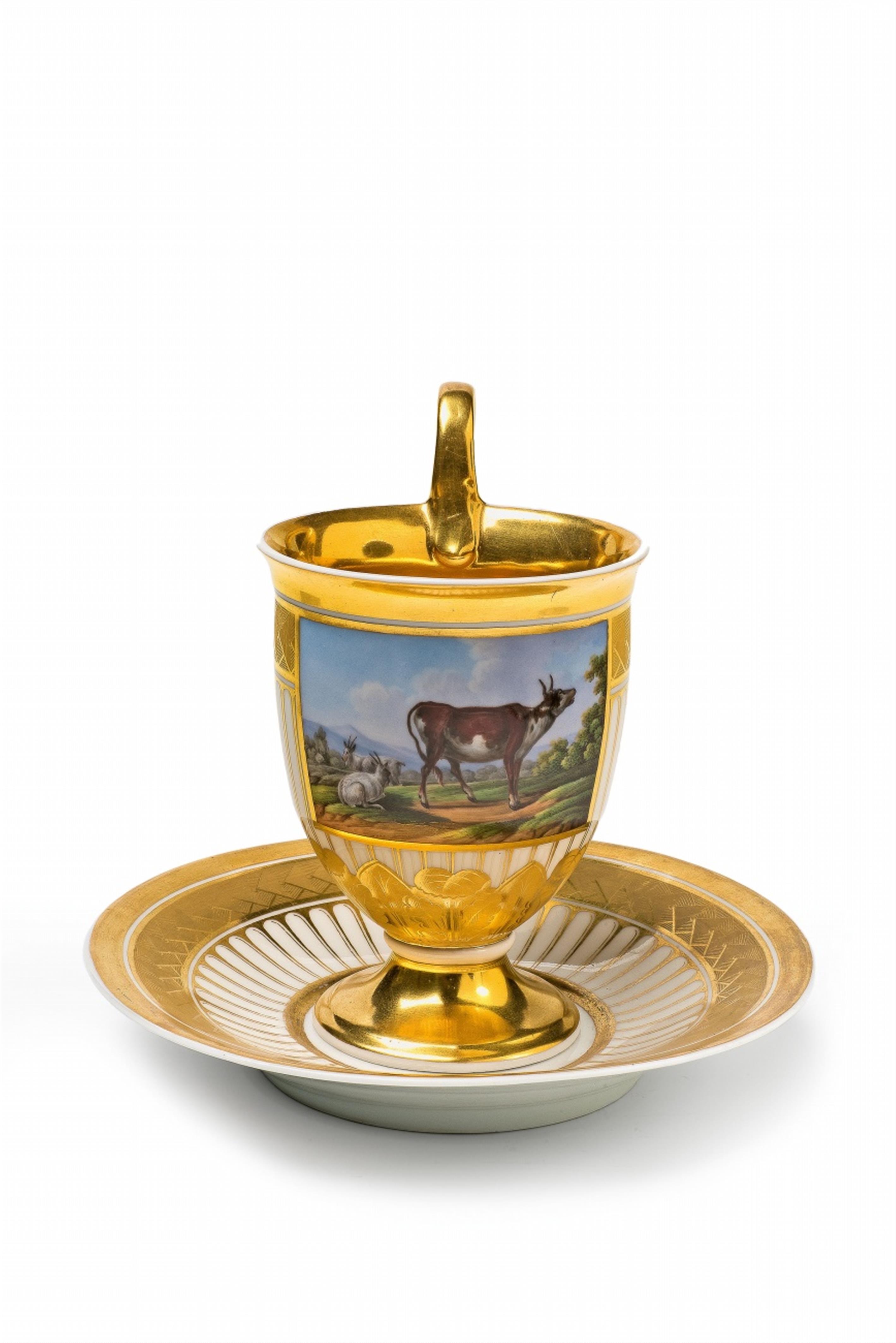 A Berlin KPM porcelain cup with a cow - image-1