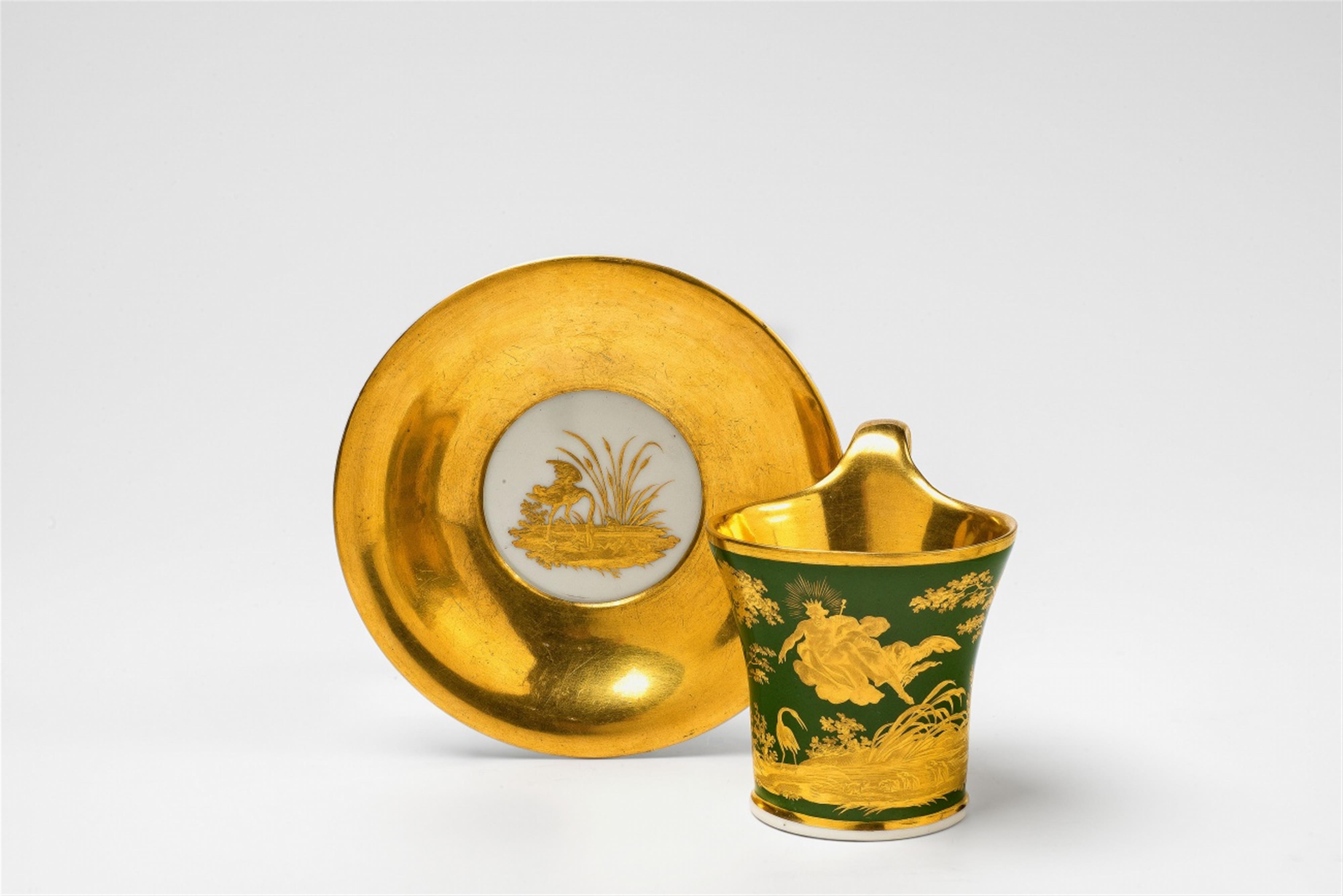 A Berlin KPM porcelain cup and saucer with Zeus - image-1