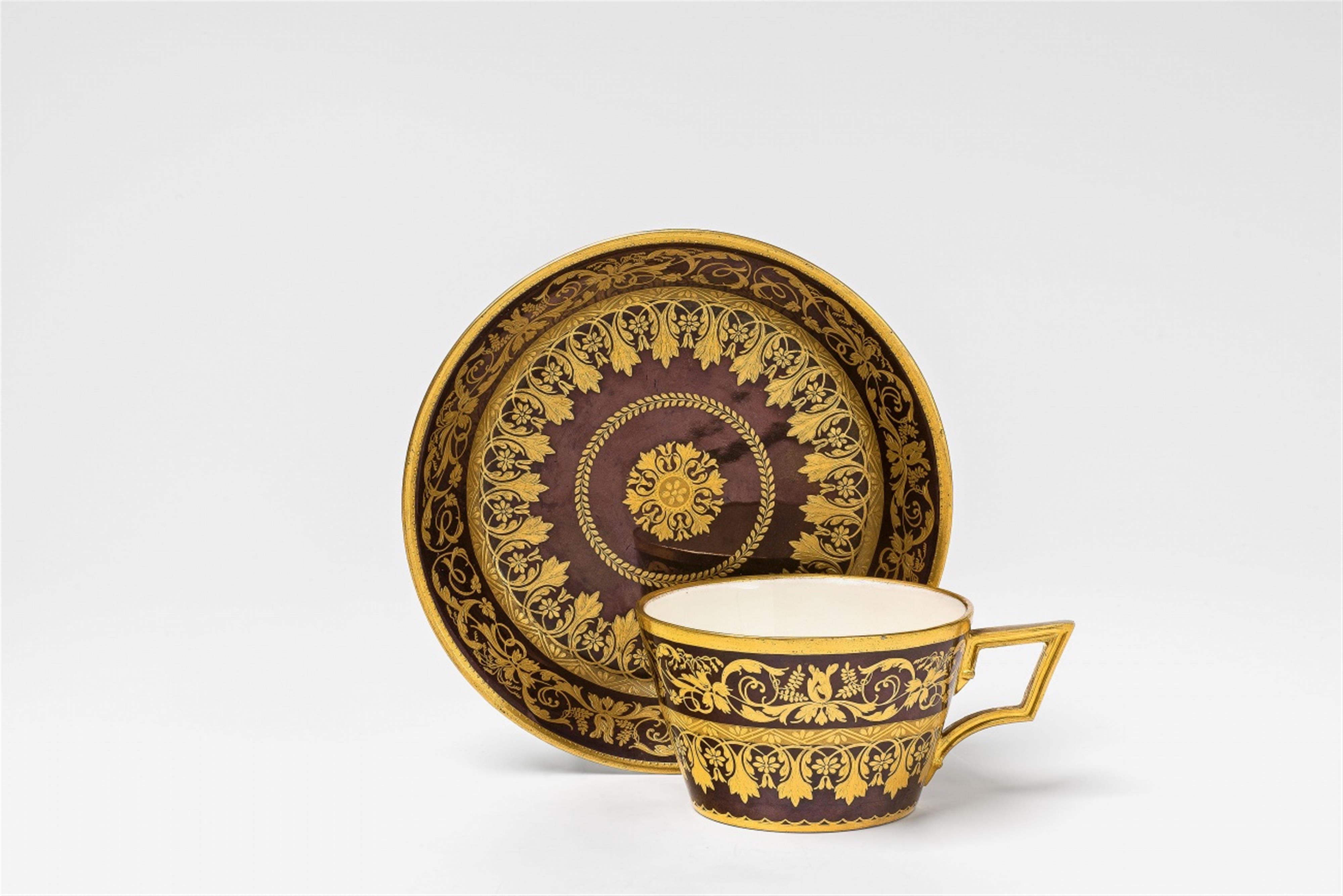 A Vienna porcelain cup and saucer with arabesque decor - image-1