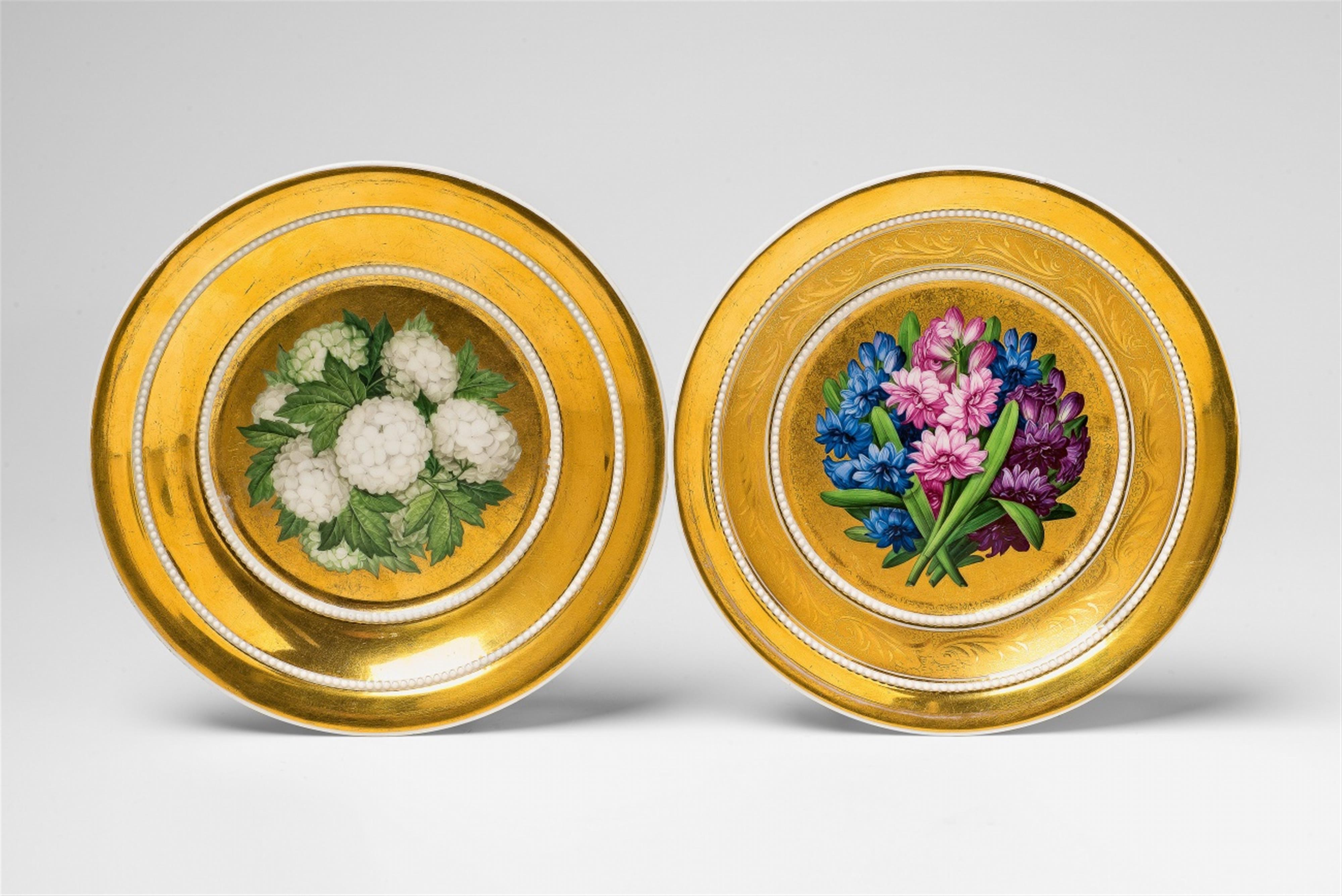 Two Berlin KPM porcelain saucers with floral decor - image-1