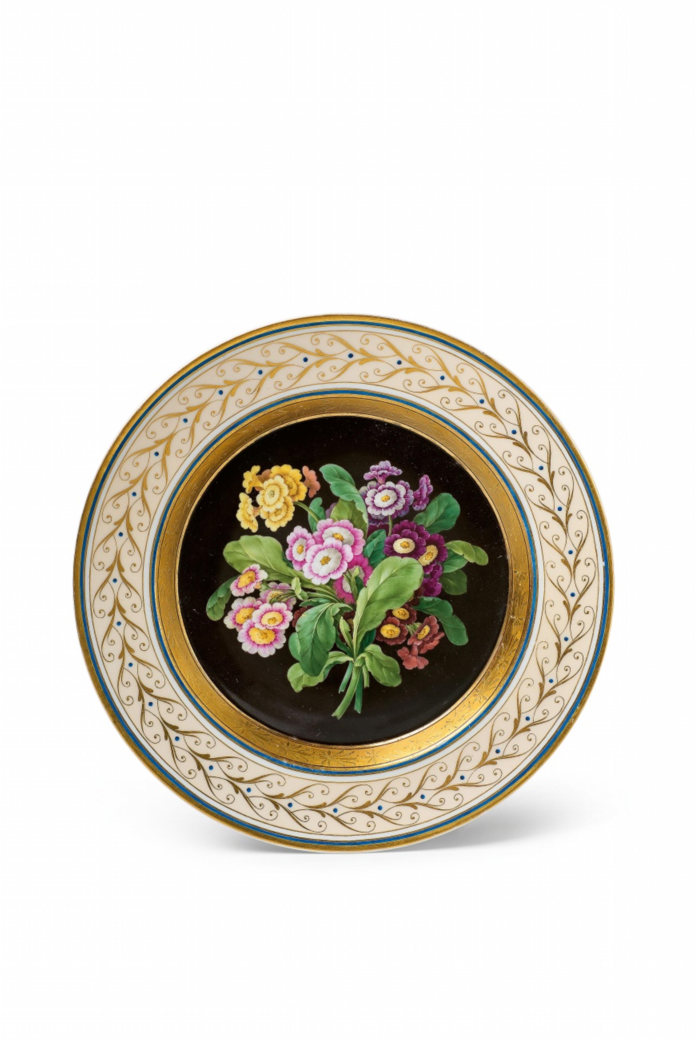 A Berlin KPM porcelain plate with a bouquet of primulas - image-1