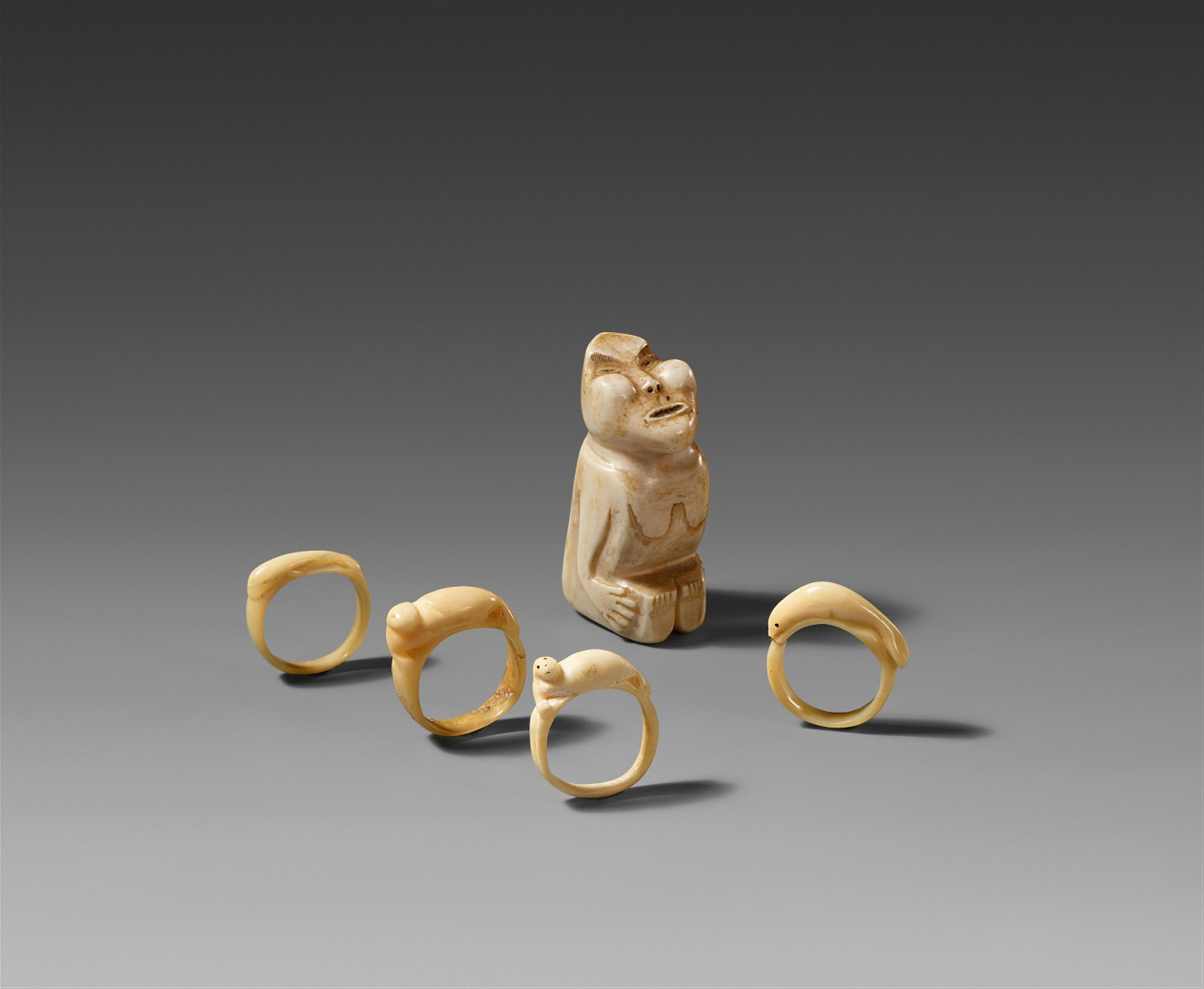 FIVE INUIT IVORY ARTEFACTS - image-1
