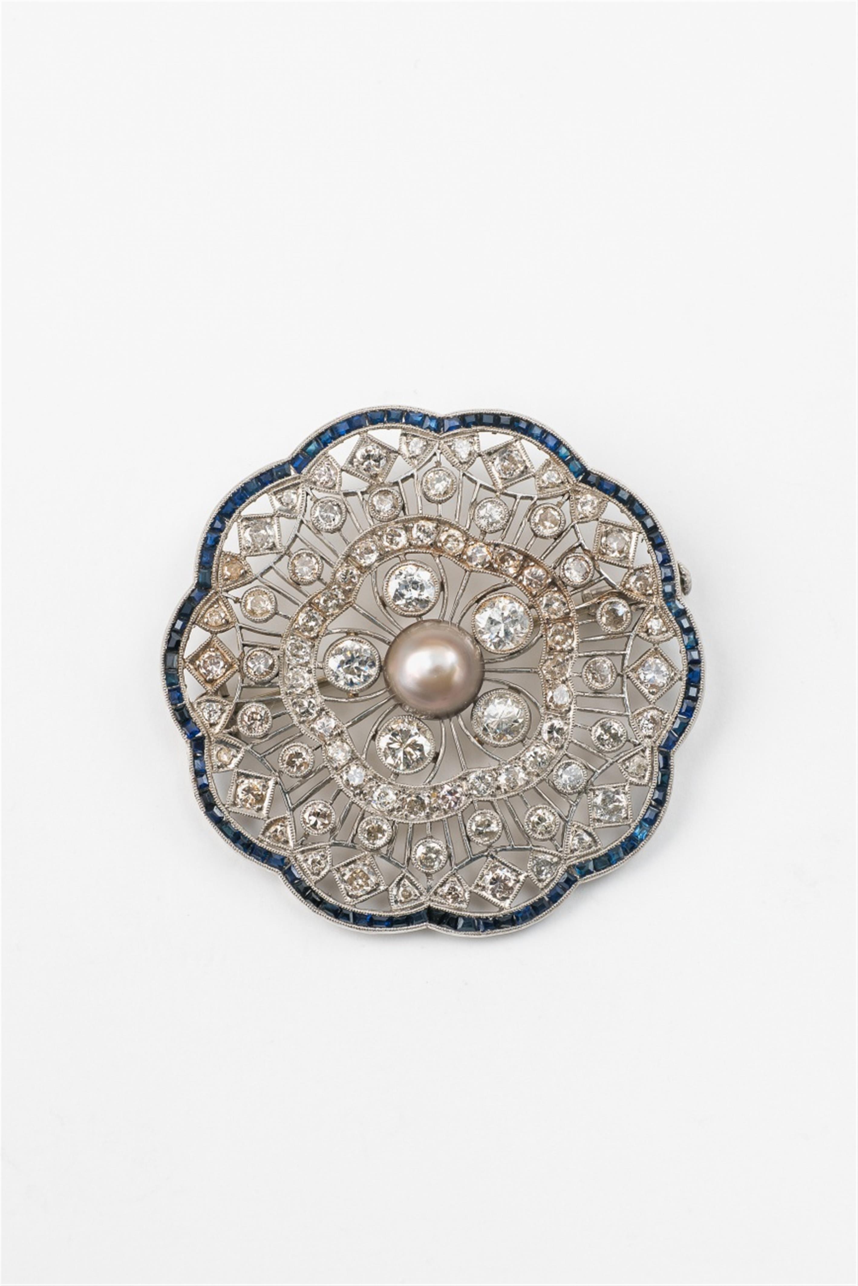 A Belle Epoque platinum sapphire and diamond brooch - image-1